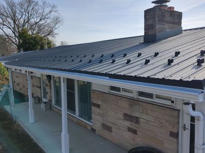 Metal Roofing Installation and Stone Veneer Exterior Refresh in Camp Hill