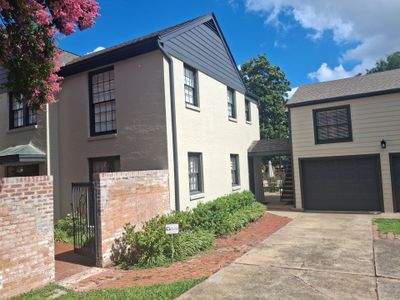 Exterior Painting in Tyler, TX | White Brick Home with Sherwin-Williams Duration