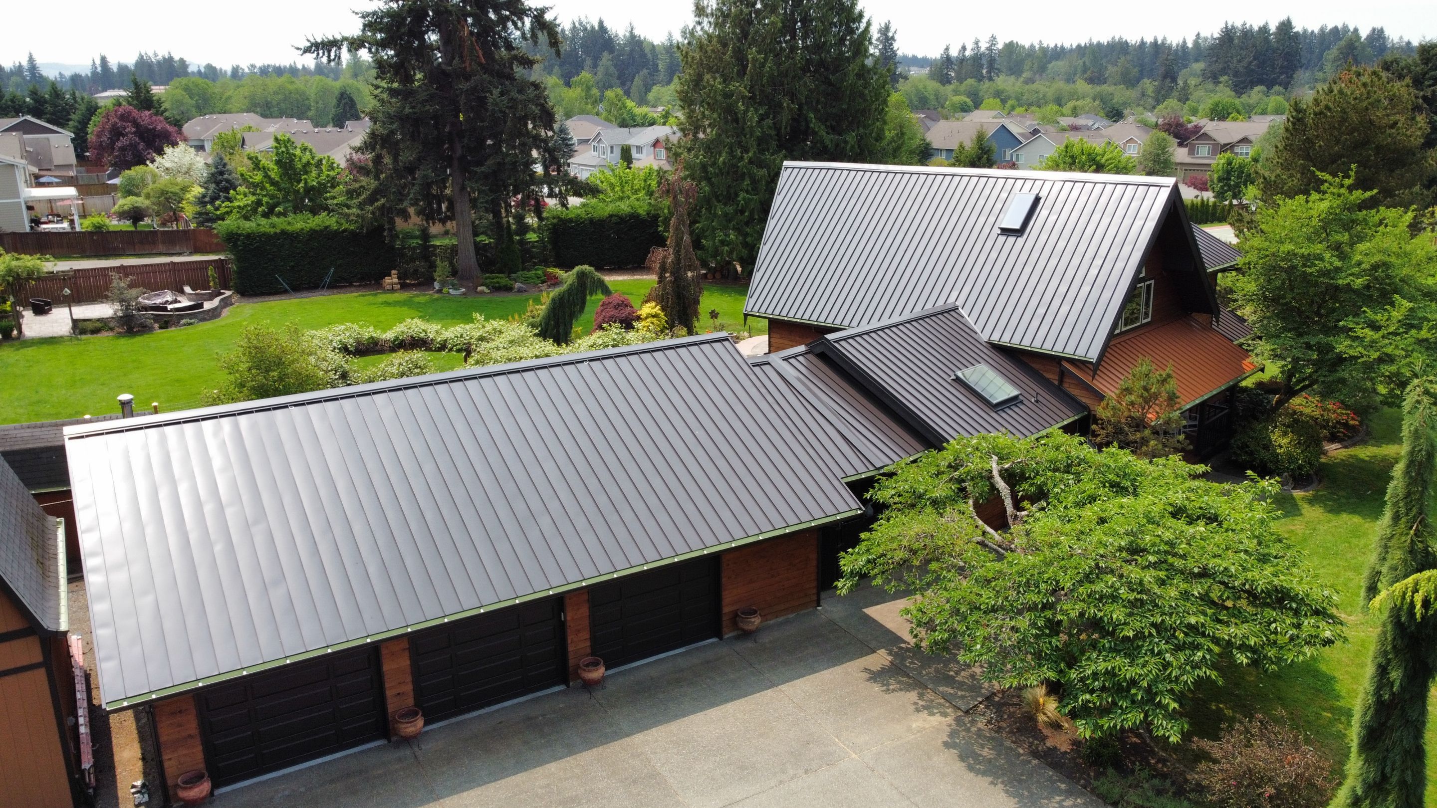 Buckley Roof Replacement using Standing Seam Metal - Dark Bronze by RoofSmart