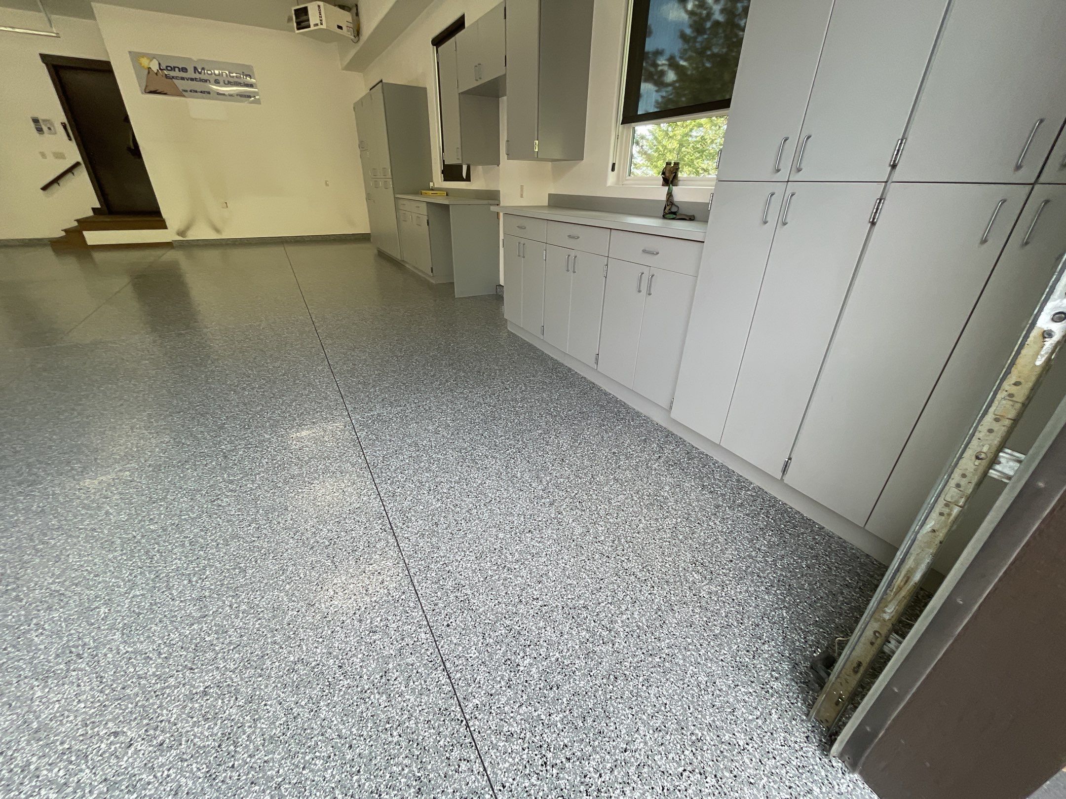 Garage Transformation using Smoke and the Penntek Evolution System by Croc Coatings, LLC