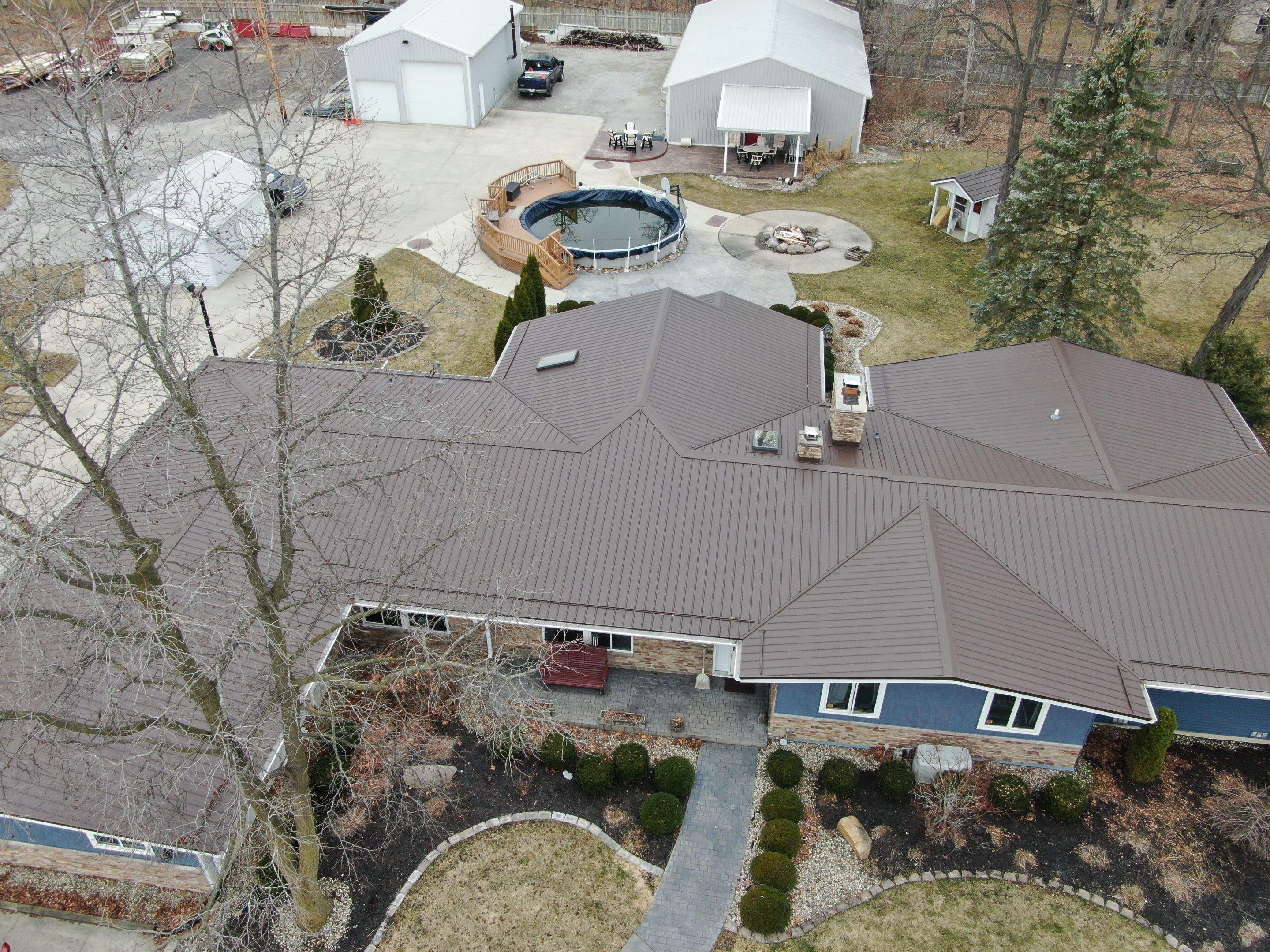 Residential Roofing Installation using Exposed Fastener Metal Roof by 4Ever Metal Roofing