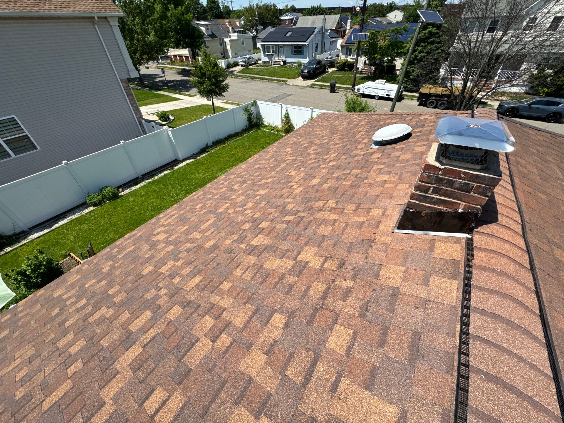 Brownwood Shingles by Reimagine Roofing