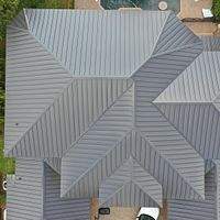 24ga 1.5" Mechanical Seam Dark Bronze by Total Roofing System The Metal Roof Experts