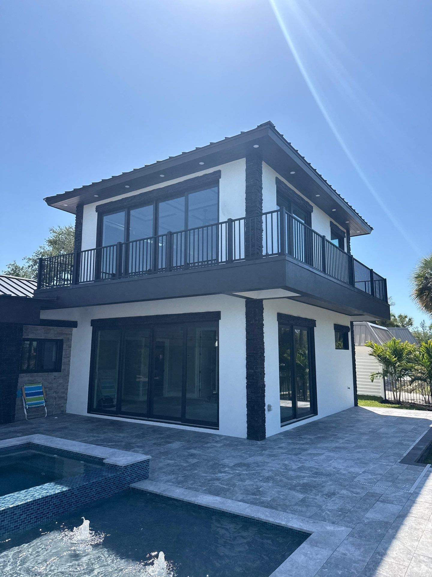 7-Inch Smooth Box Seamless Gutters using black seamless gutters in Siesta Key Fl by Gutter Professors