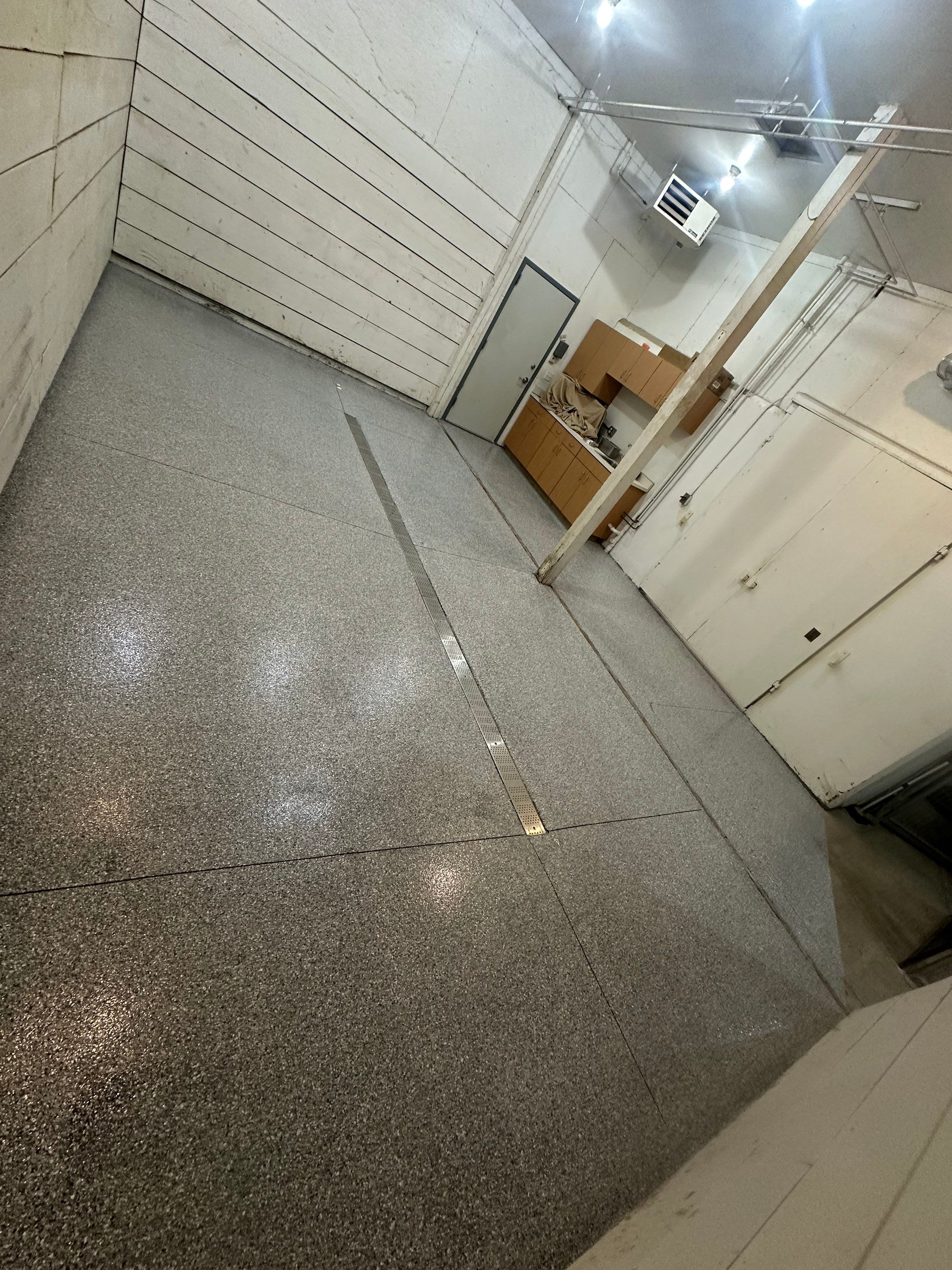 Durable Commercial Concrete Coatings for Brandon Valley Veterinary Clinic by Select Painting, Coatings & Garage Cabinets