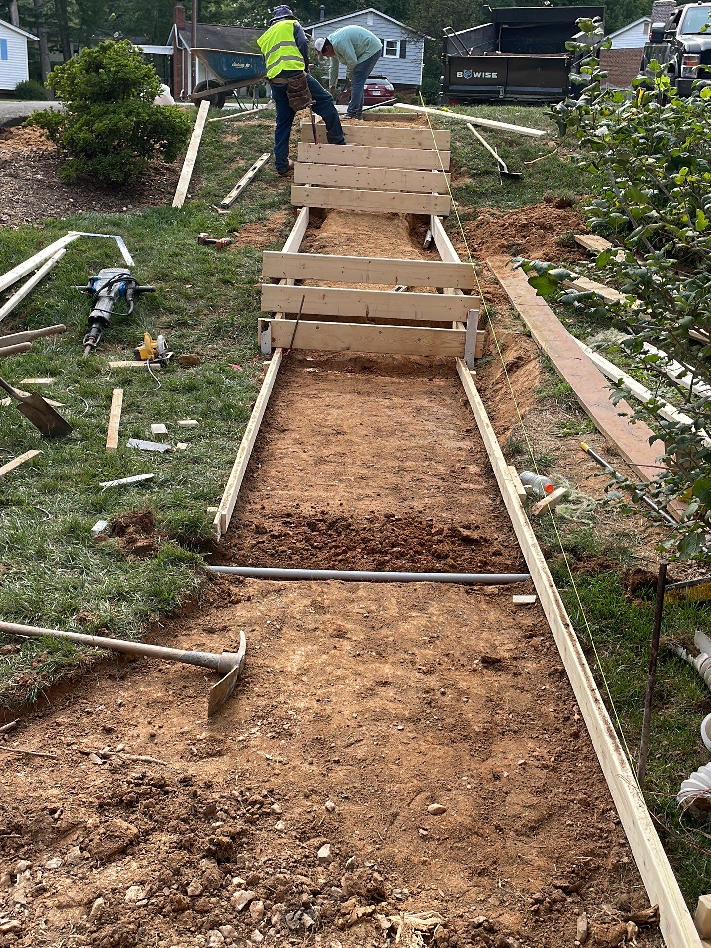 New walkway with stairs and a new front porch by Fairfax Contractors, LLC