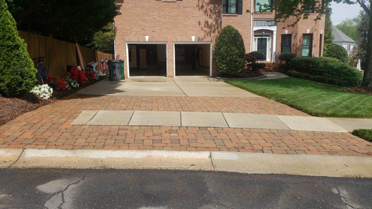 patio cleaning using cleaner by Power Wash Masters LLC