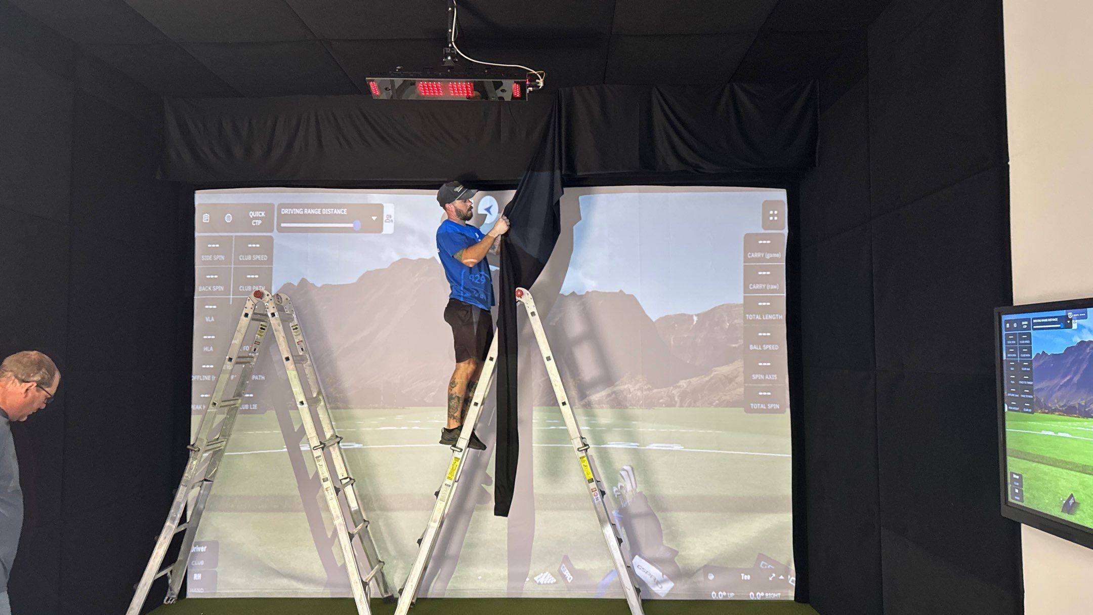 A Custom Golf Sim Made To Fit The Entire Room by Banner Garage