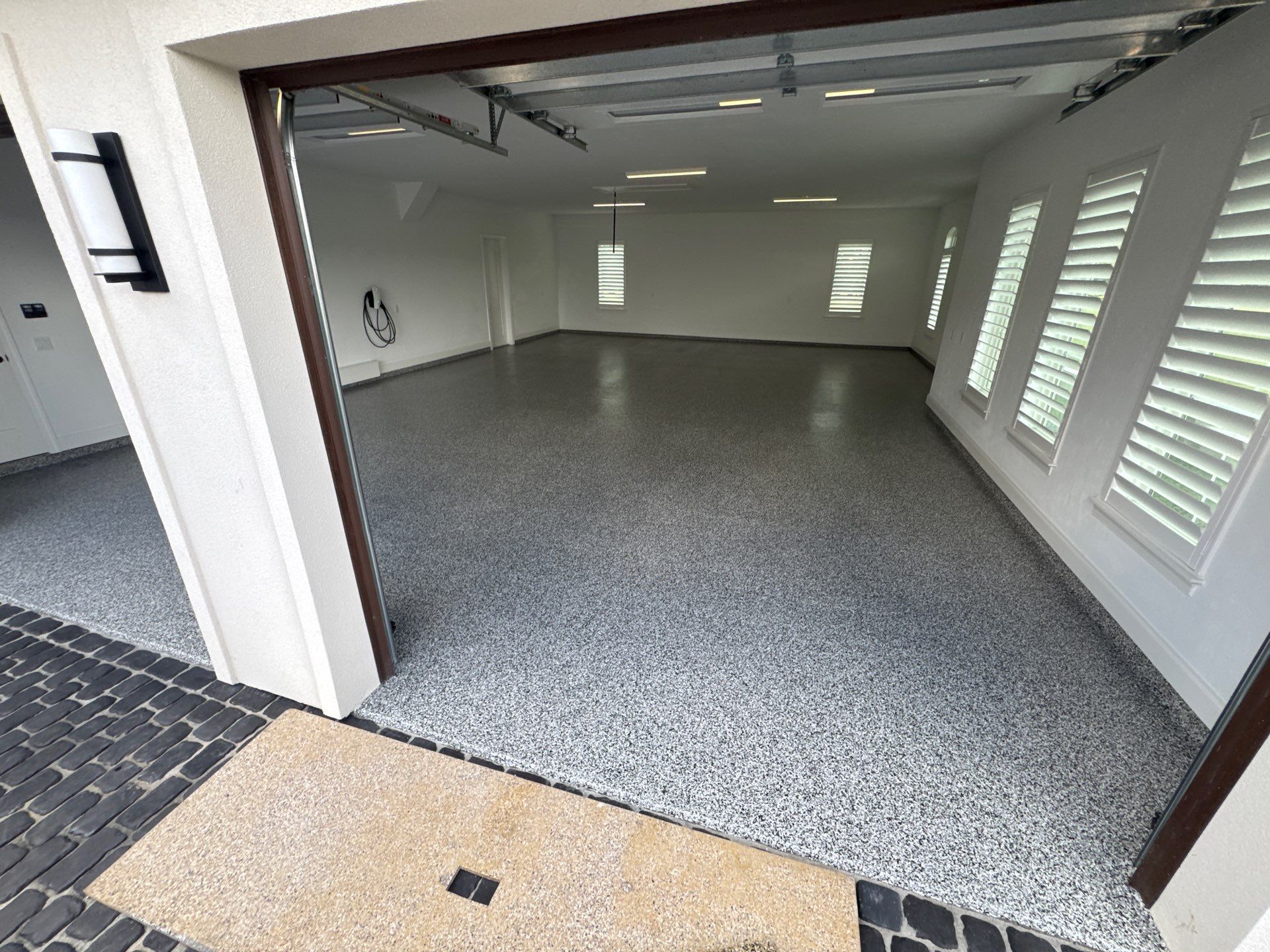 Garage Project in Newberry, FL in Domino by Cross Creek Concrete Coatings
