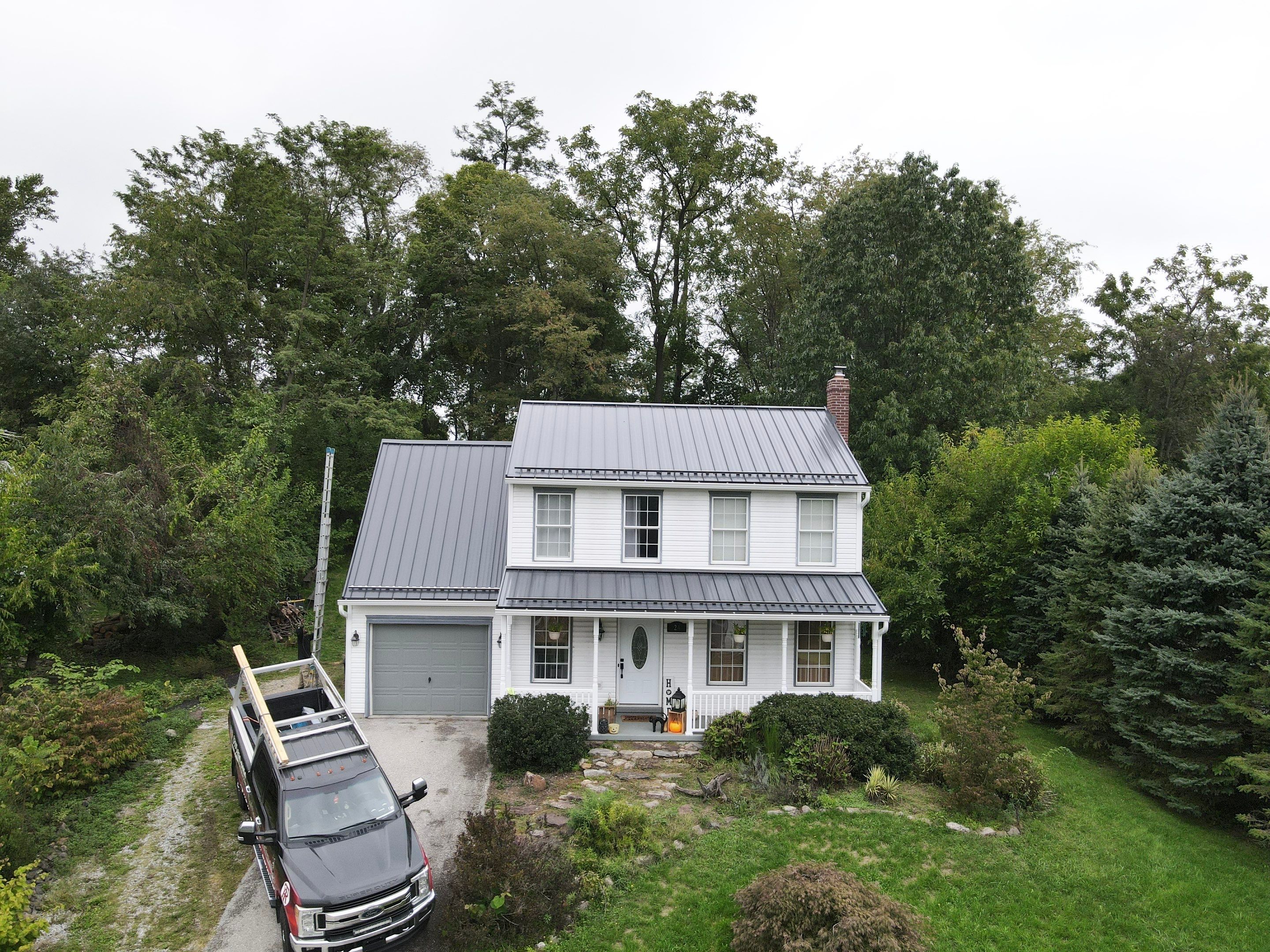 12" Mechanical Seam by Teflon Roofing