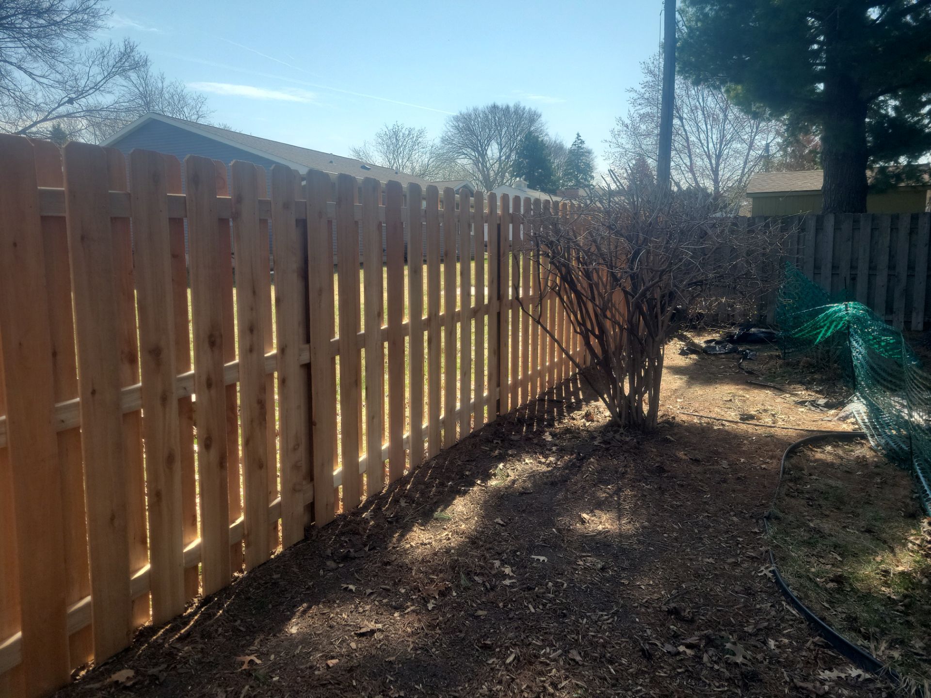 Cedar Shadowbox Wood Privacy Fence Installation in Cedar Falls by Perfect Picket Fence and Stain