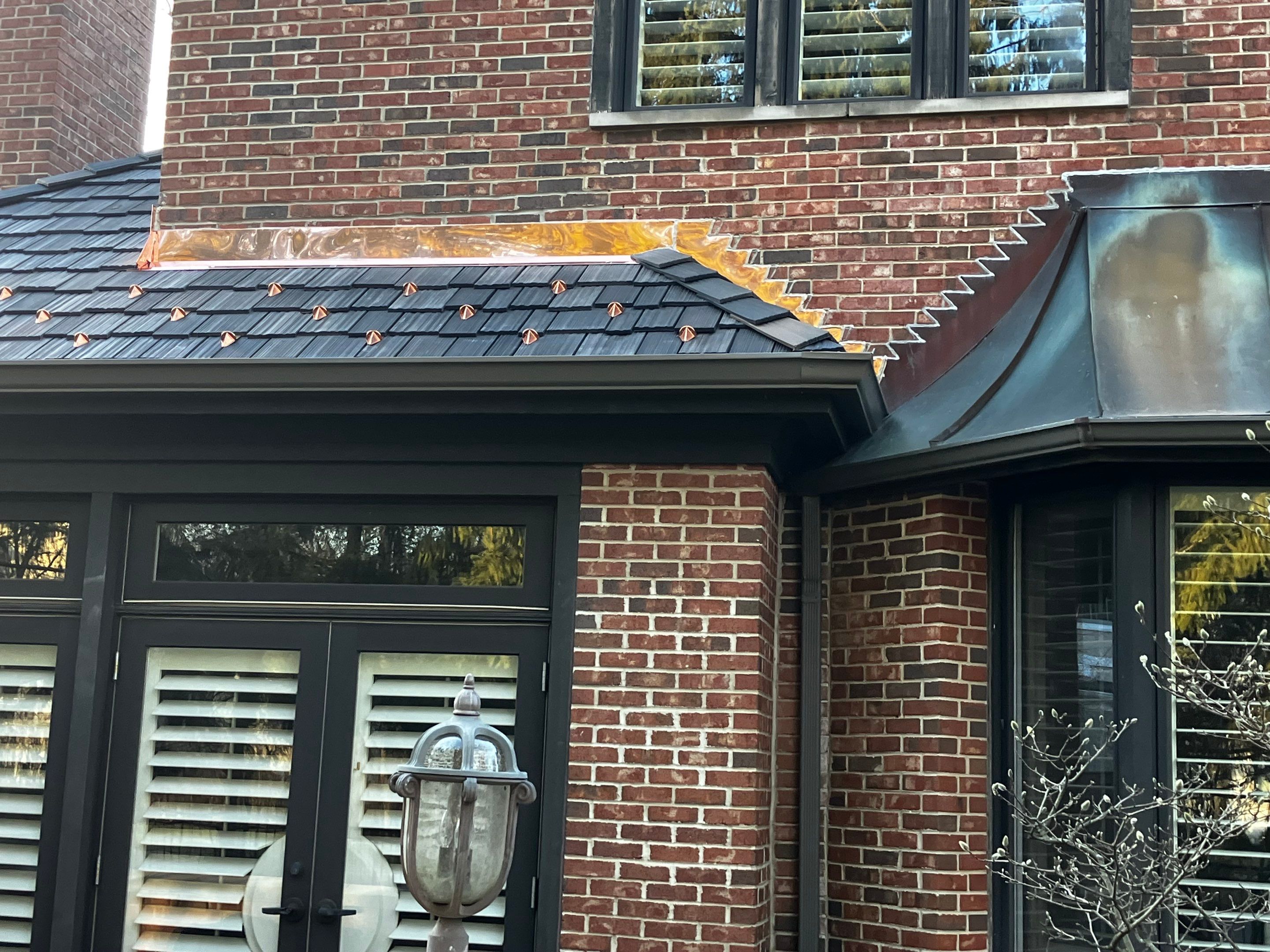 DaVinci Slate Installation with Copper Valleys by Custom Installations