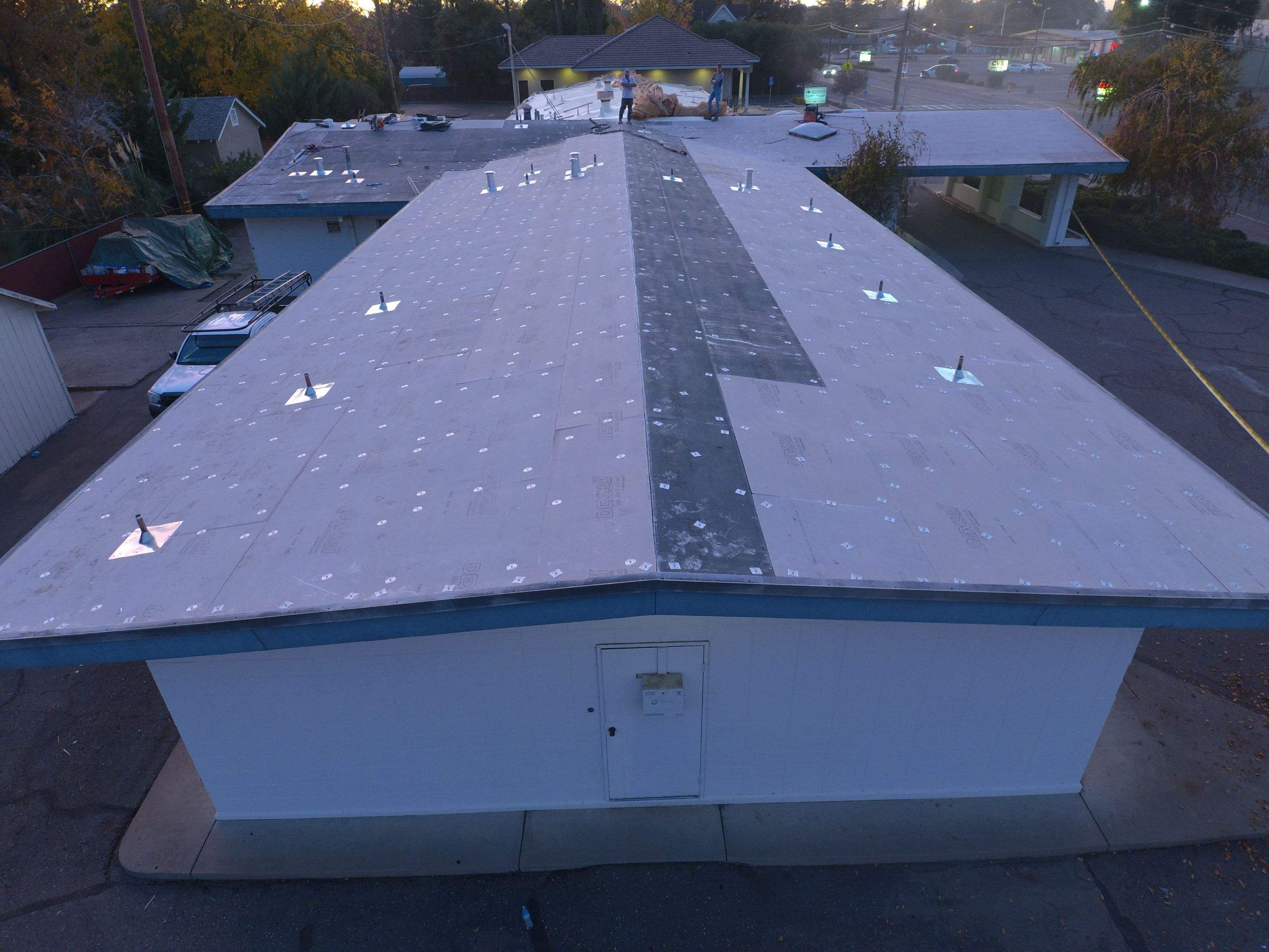 Spray foam and coatings using Conklin Benchmark/PUMA XL coatings and spray foam by Straight Edge Roofing Inc