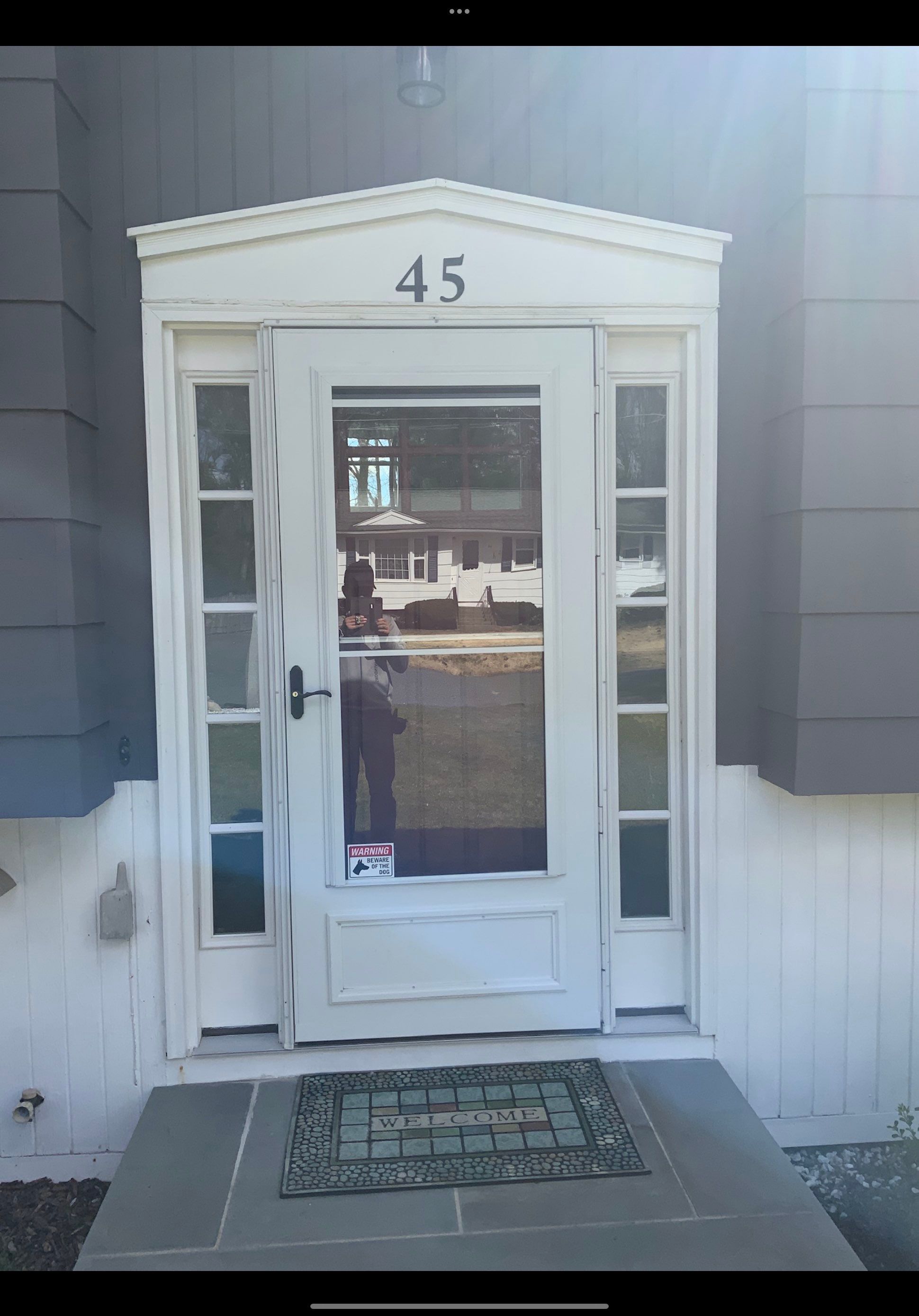 Siding and door replacement in Holliston, MA by UBrothers Construction