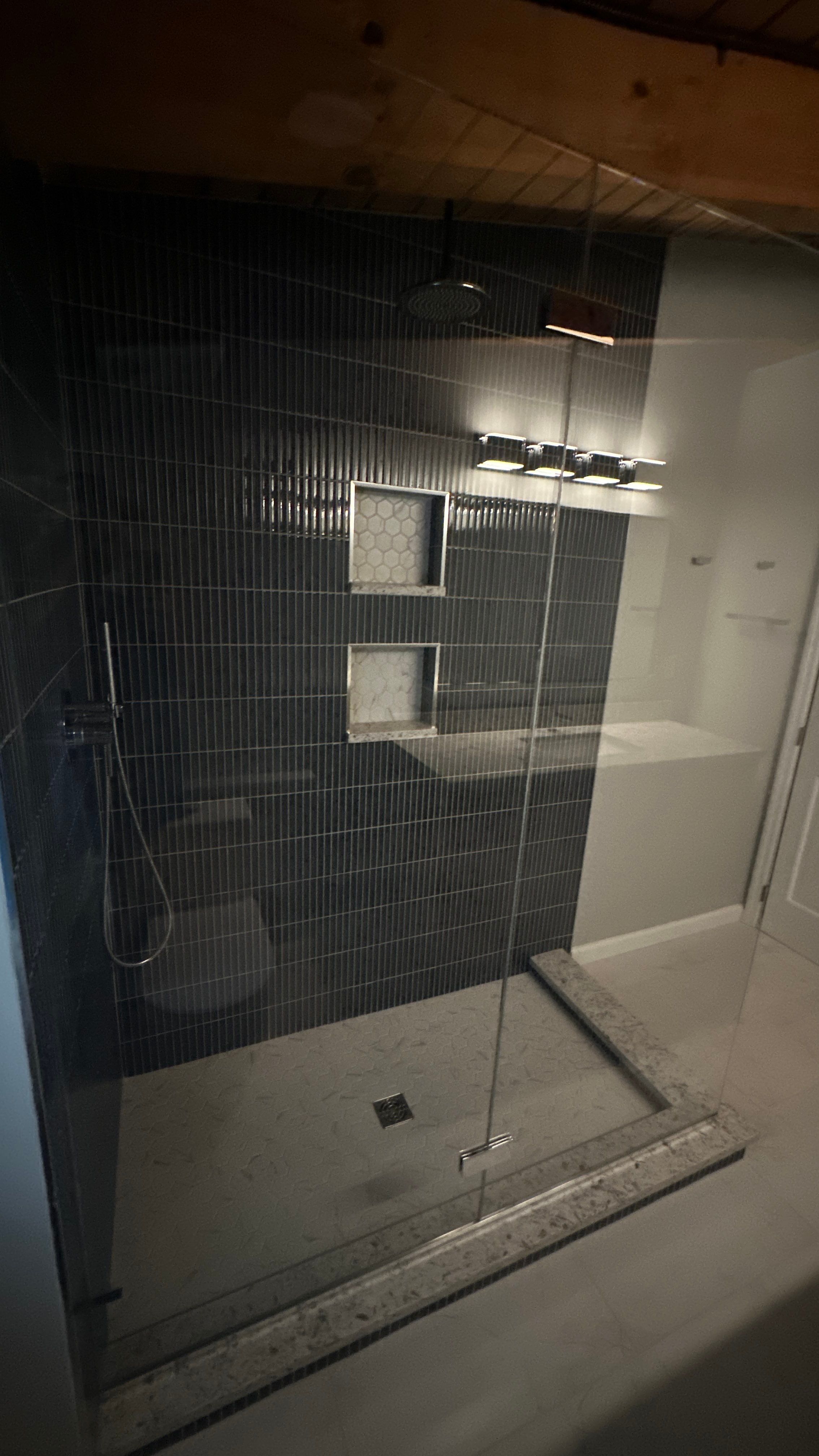 Brandt Double Bathroom Remodel by Integrity Tile and Home LLC