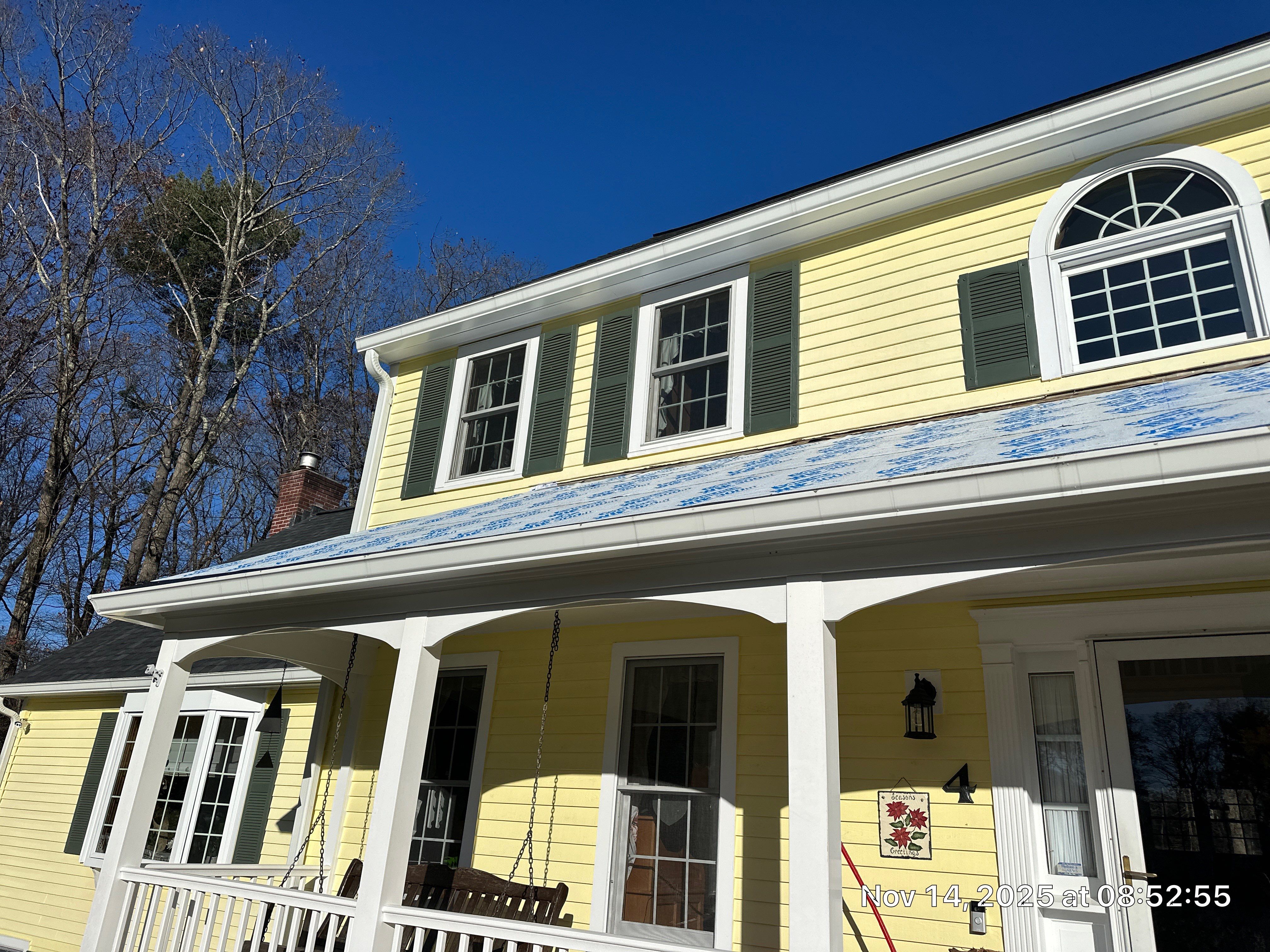 Chelmsford Premium Roof: Onyx Black Shingles with Standing Seam Metal Porch by Mighty Dog Roofing of Greater Middlesex County