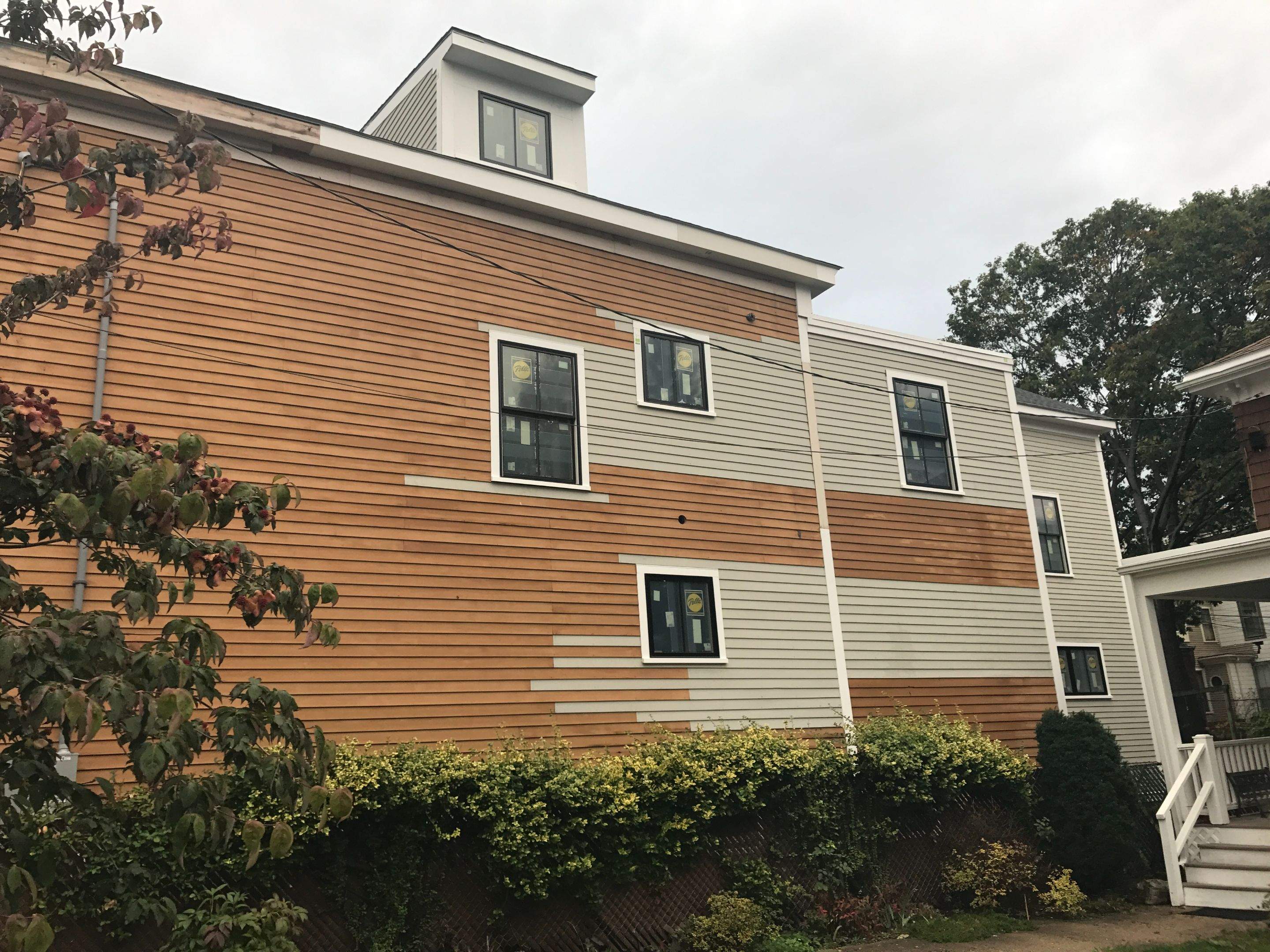 Siding Installation using Wood Clapboards by UBrothers Construction