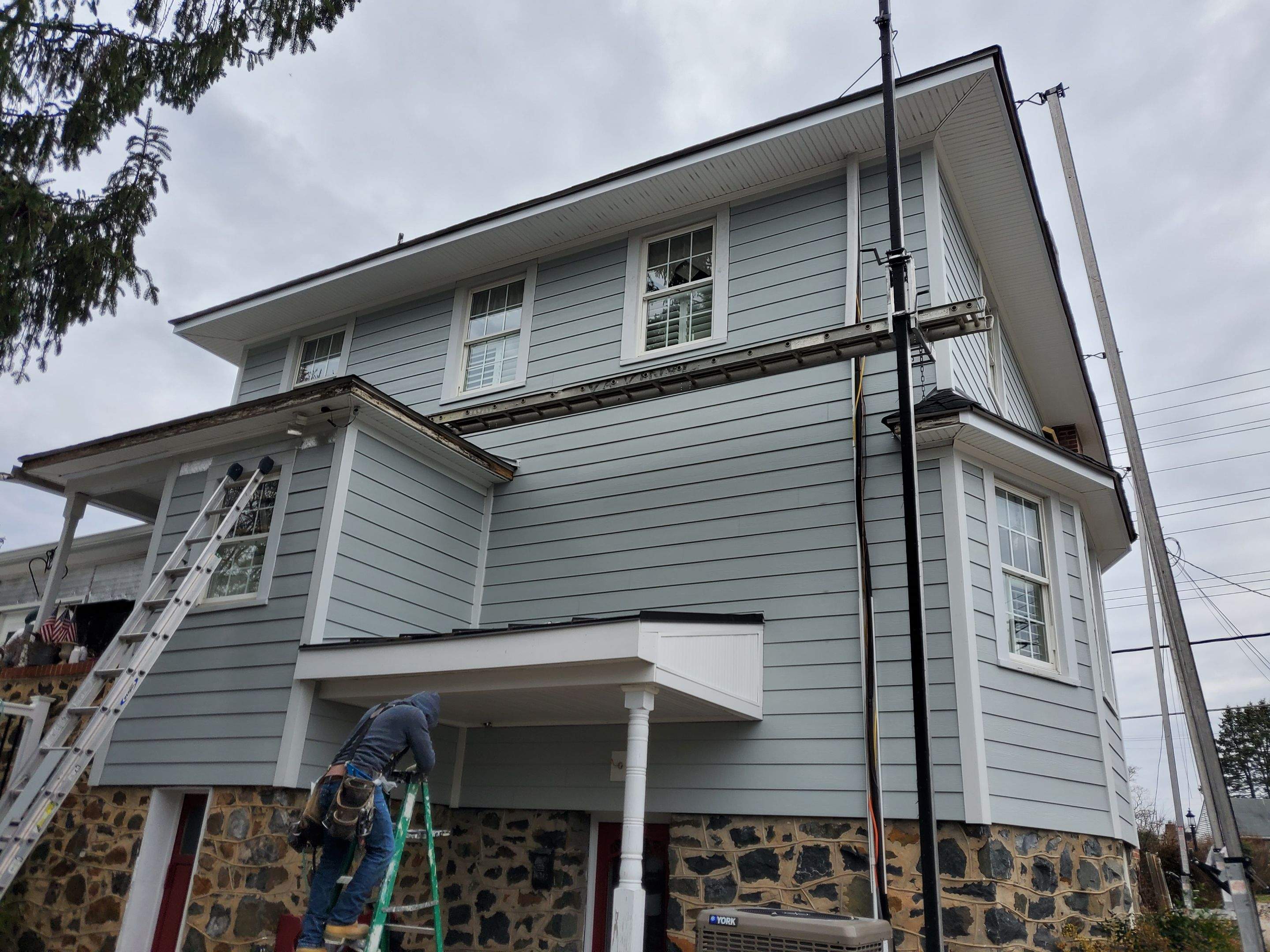 Siding Replacement using James Hardie siding by American Home Contractors