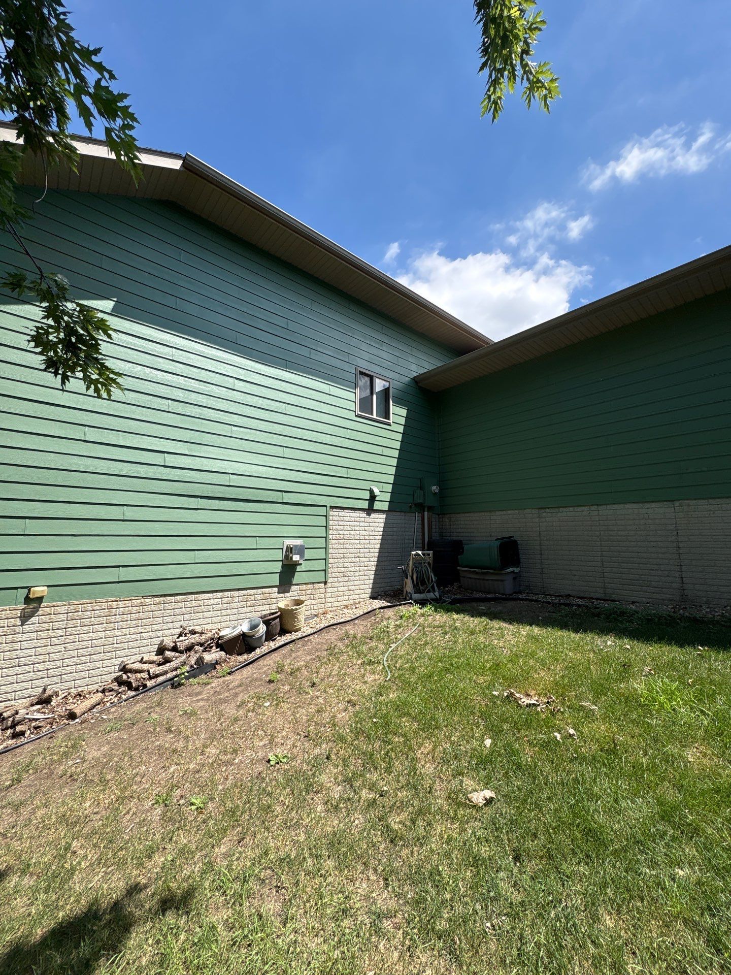 Full Exterior Residential Painting and Siding Refresh in Tea by Select Painting, Coatings & Garage Cabinets