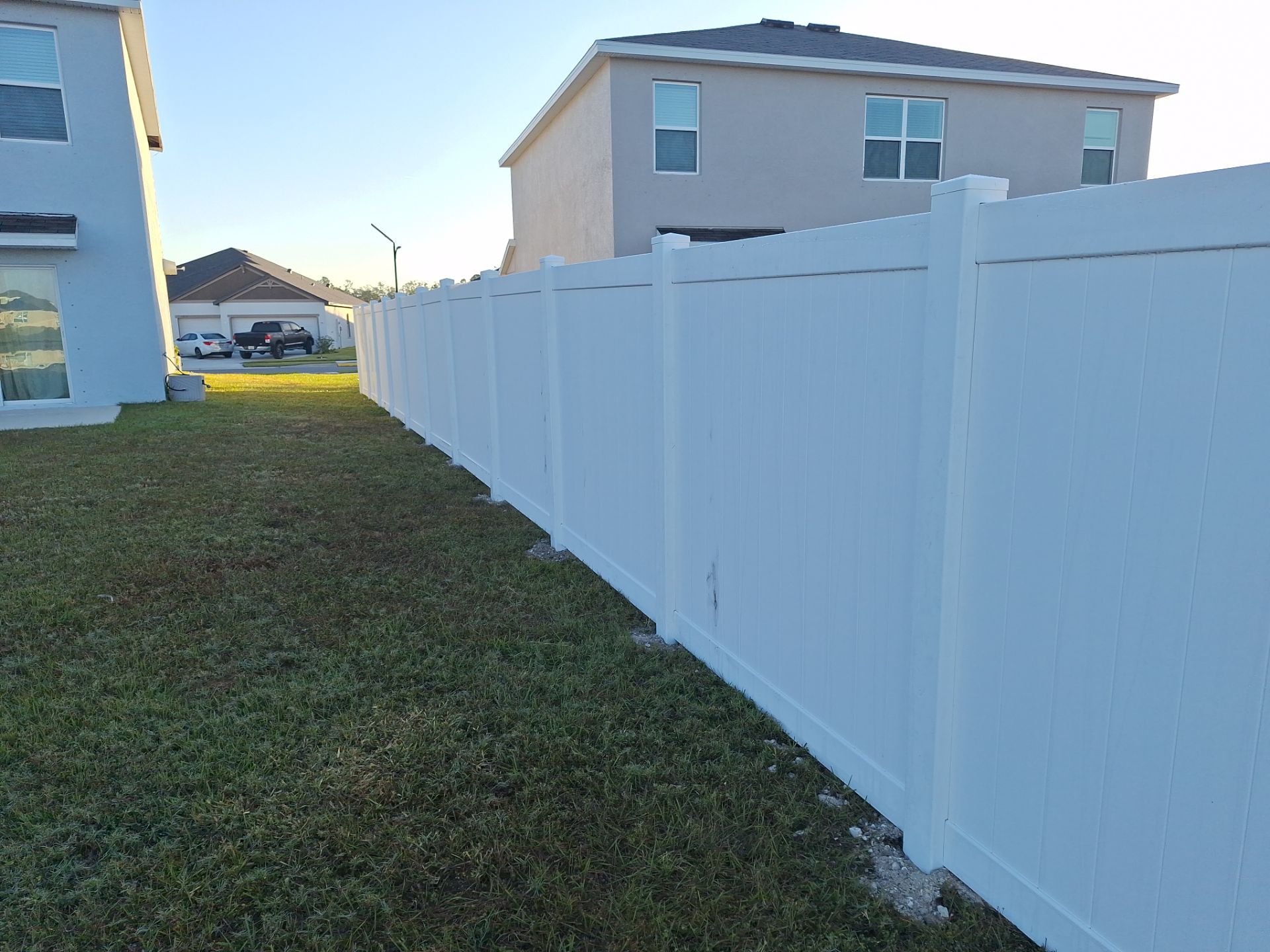 Vinyl Fence Installation using 6Ft White Vinyl Privacy Fence with a 4Ft White Clearwater Picket Fence by Asap fence and gates, LLC