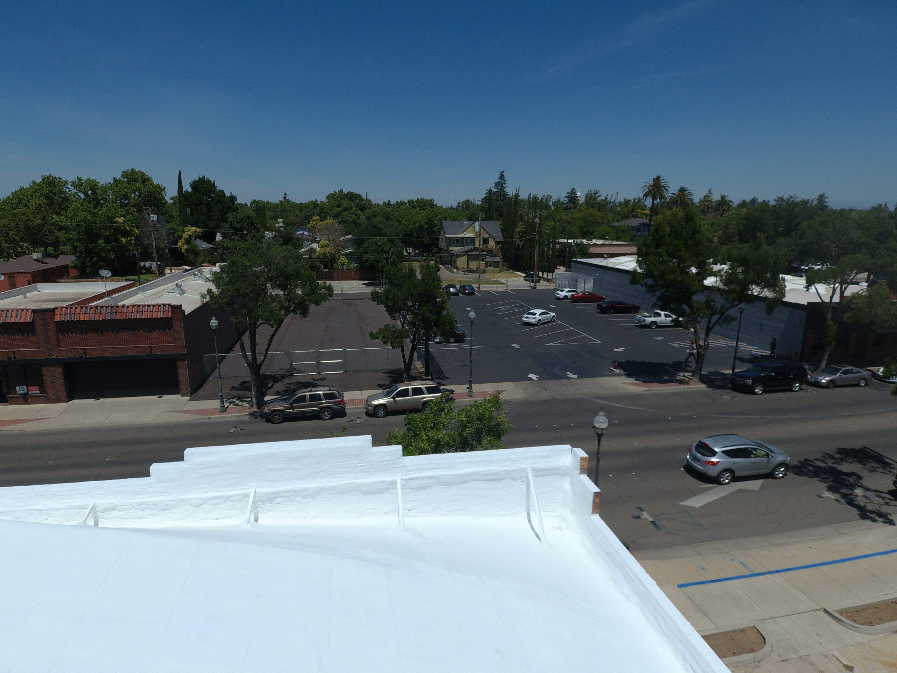 Spray foam and coatings using Conklin Benchmark/PUMA XL coatings and spray foam by Straight Edge Roofing Inc