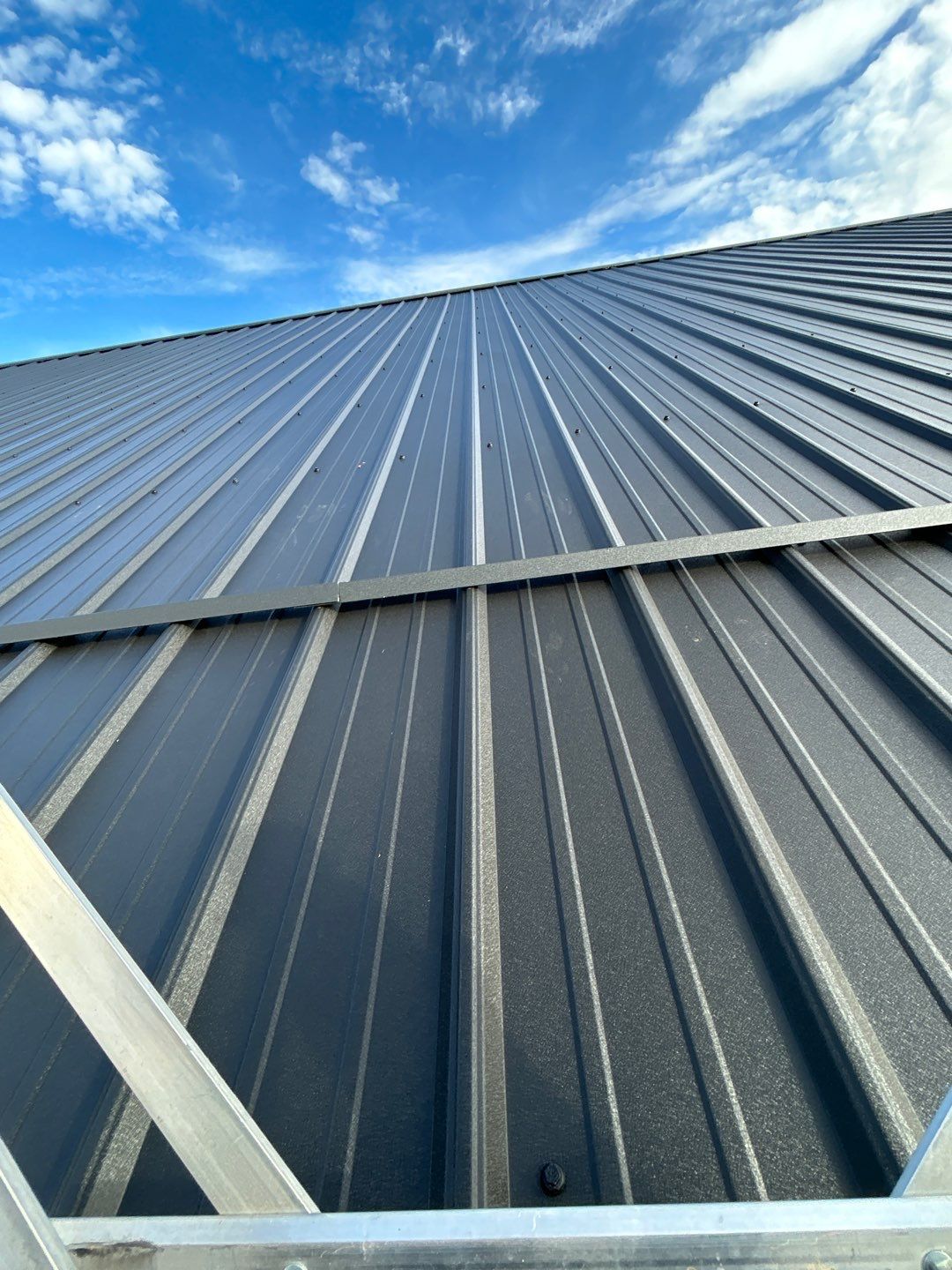 Residential Roofing Installation using Performance Panel Metal - Frost Black by RoofX 