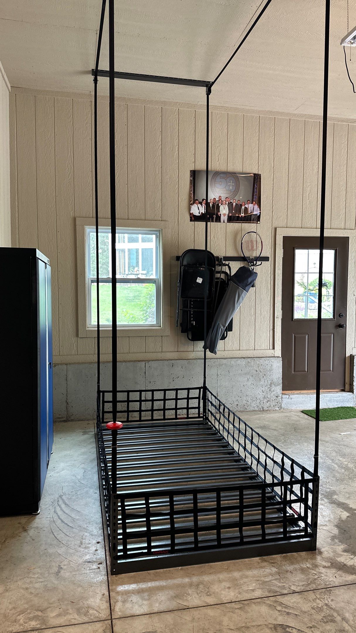 Tom R. got our handy Onrax power rack  by Banner Garage
