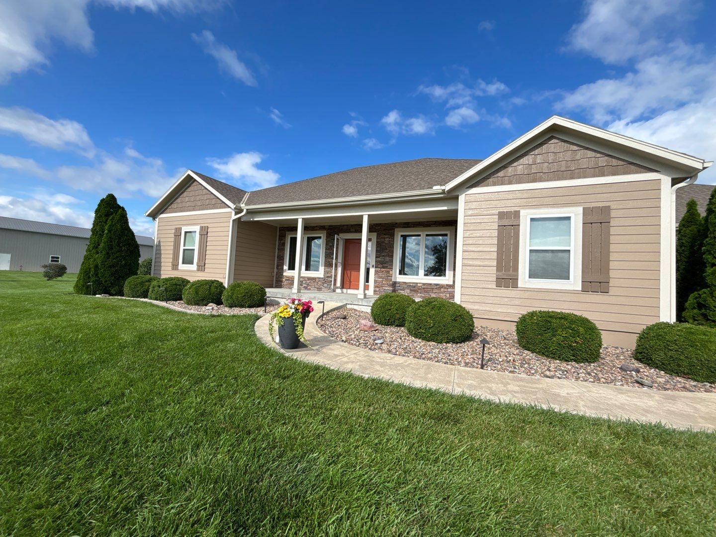 Exterior Painting and Wood Rot Repair for Wellsville Residence by Cougar Painting
