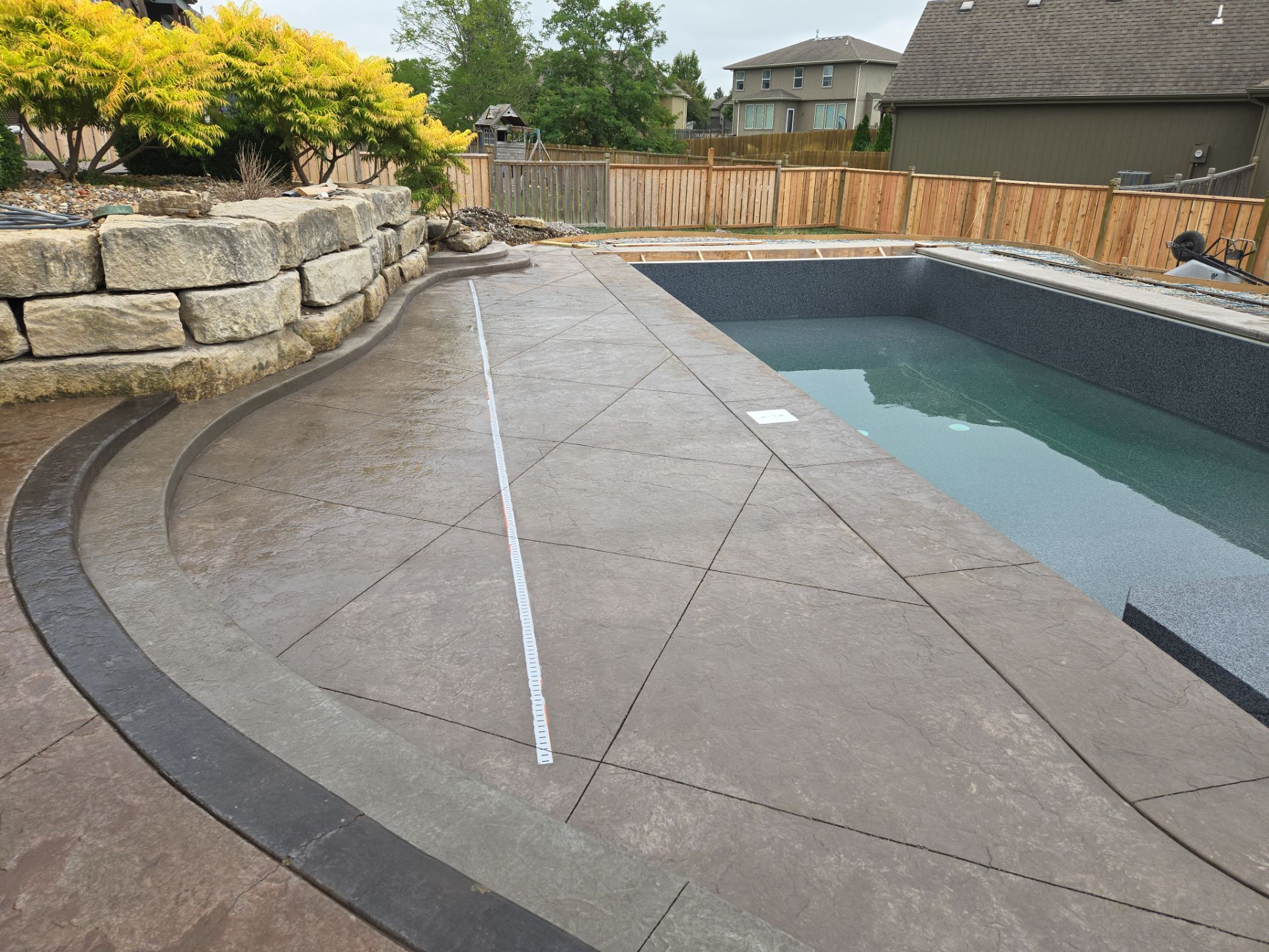 Back Yard Pool Patio by LAND ESCAPES LLC