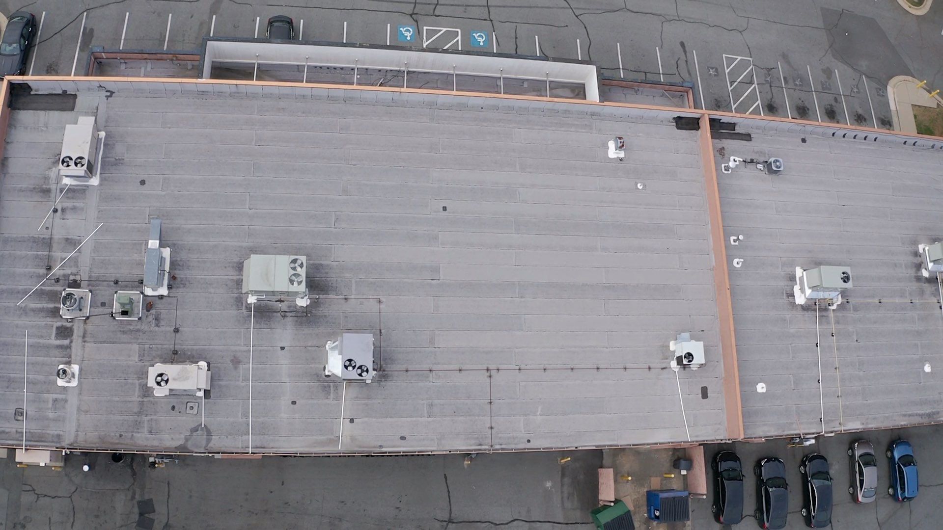 Commercial Coating using Poly Urerthane and Silicone Coating by Just In Time Roofing and Restoration