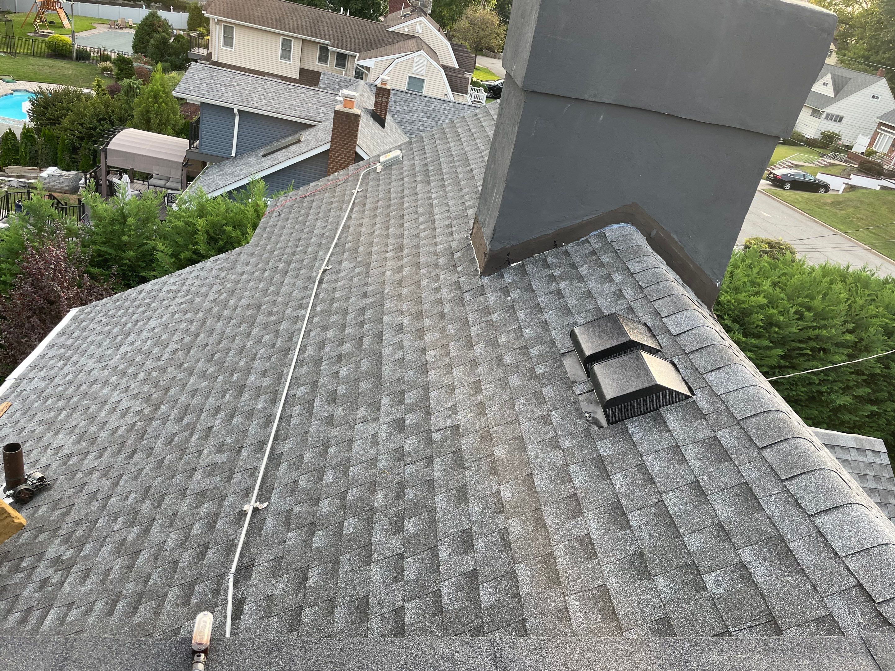 Estate Gray Shingles by Reimagine Roofing