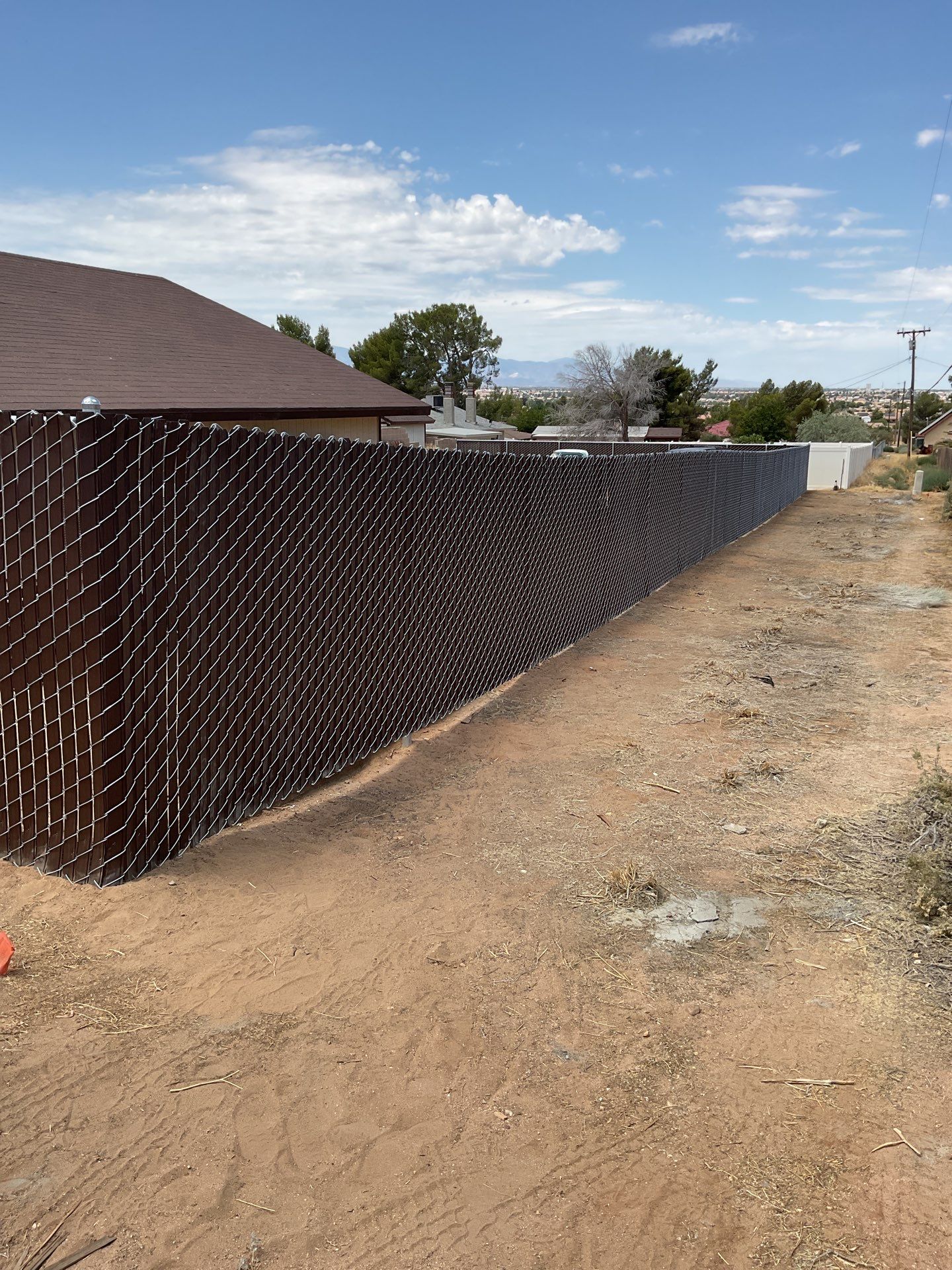 Dark Brown Privacy Chain Link Fence by Fence Guys Inc.