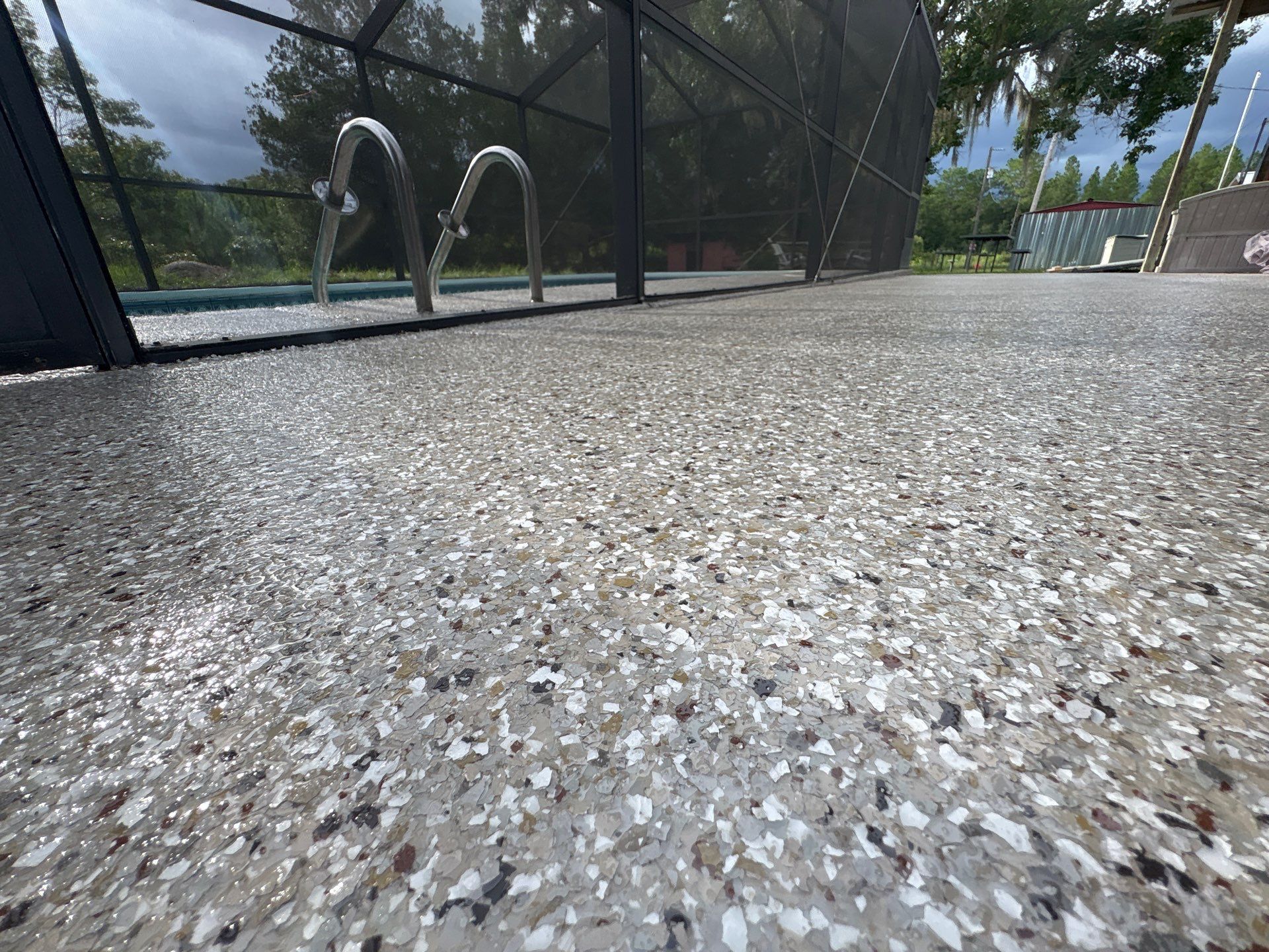 Pool Deck and Driveway in Pebble Beach by Cross Creek Concrete Coatings