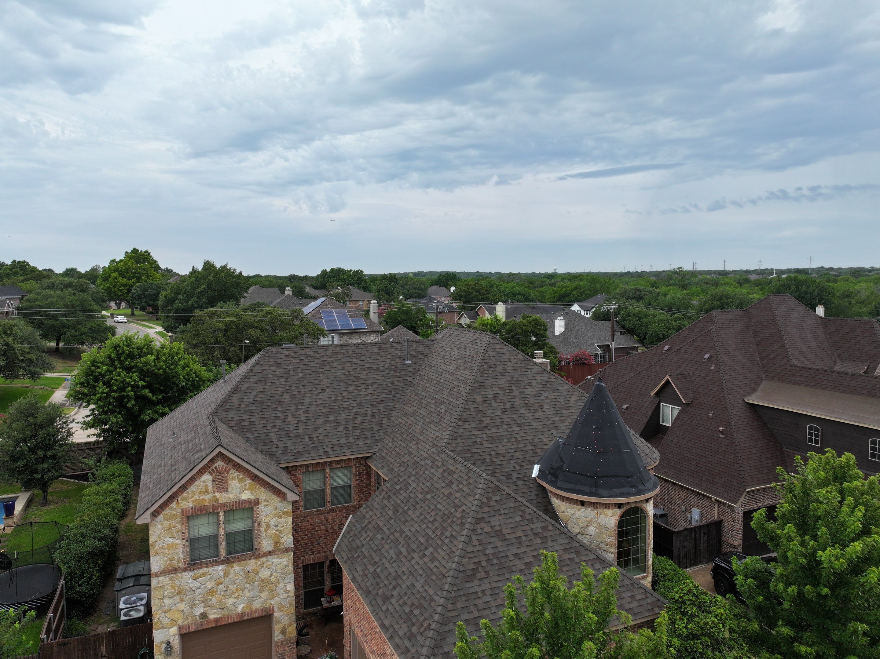 Installing Custom copper turret and Malarkey Vista Class 4 shingles Hail Damage Upgrade by Becker Roofing and Exteriors
