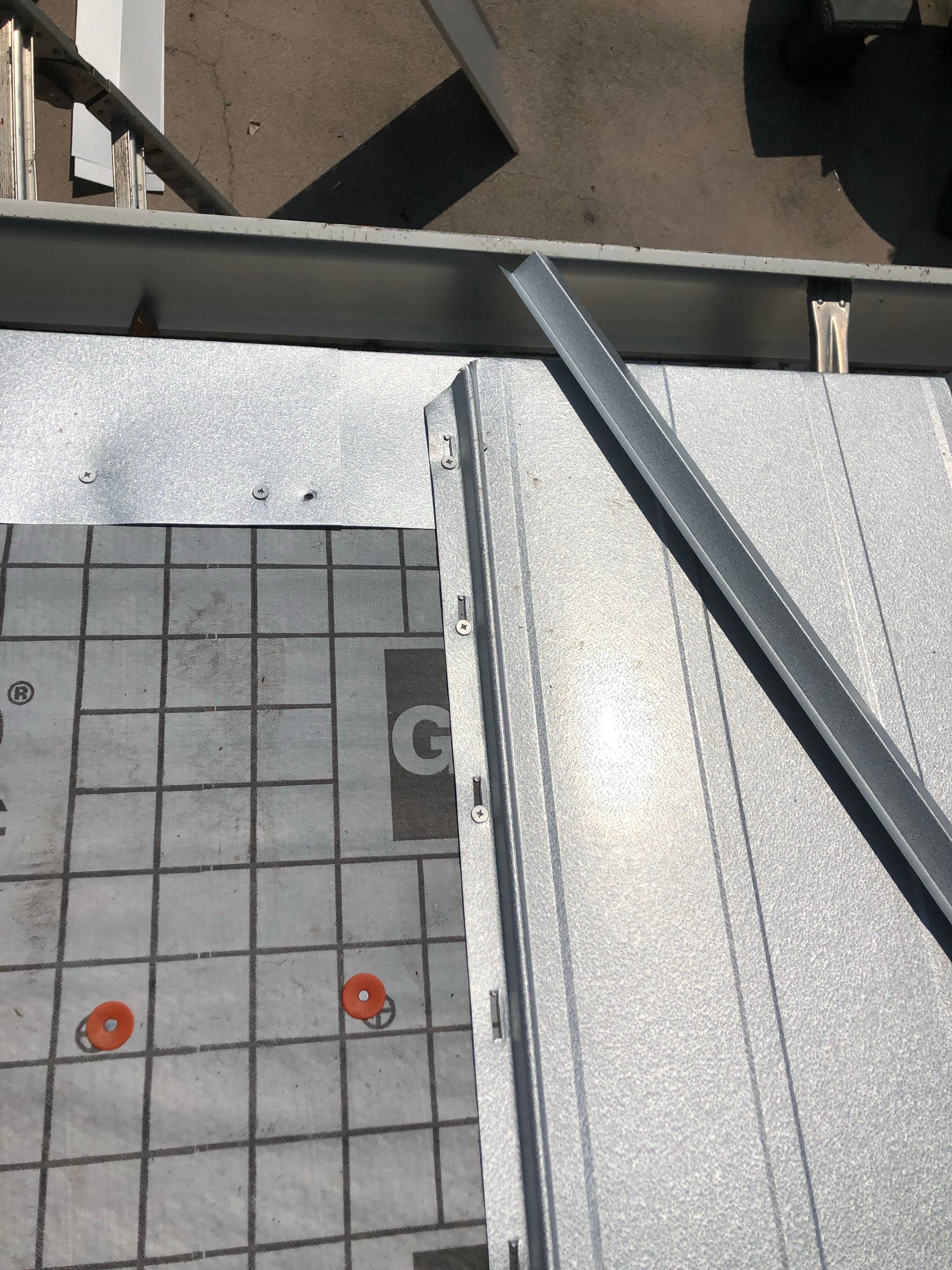 Residential Roofing Installation using Metal roofing by American Roofing & Construction LLC