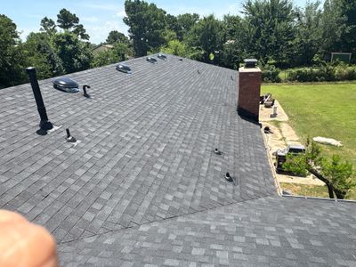 roof and chimney flashing replacement in Mustang