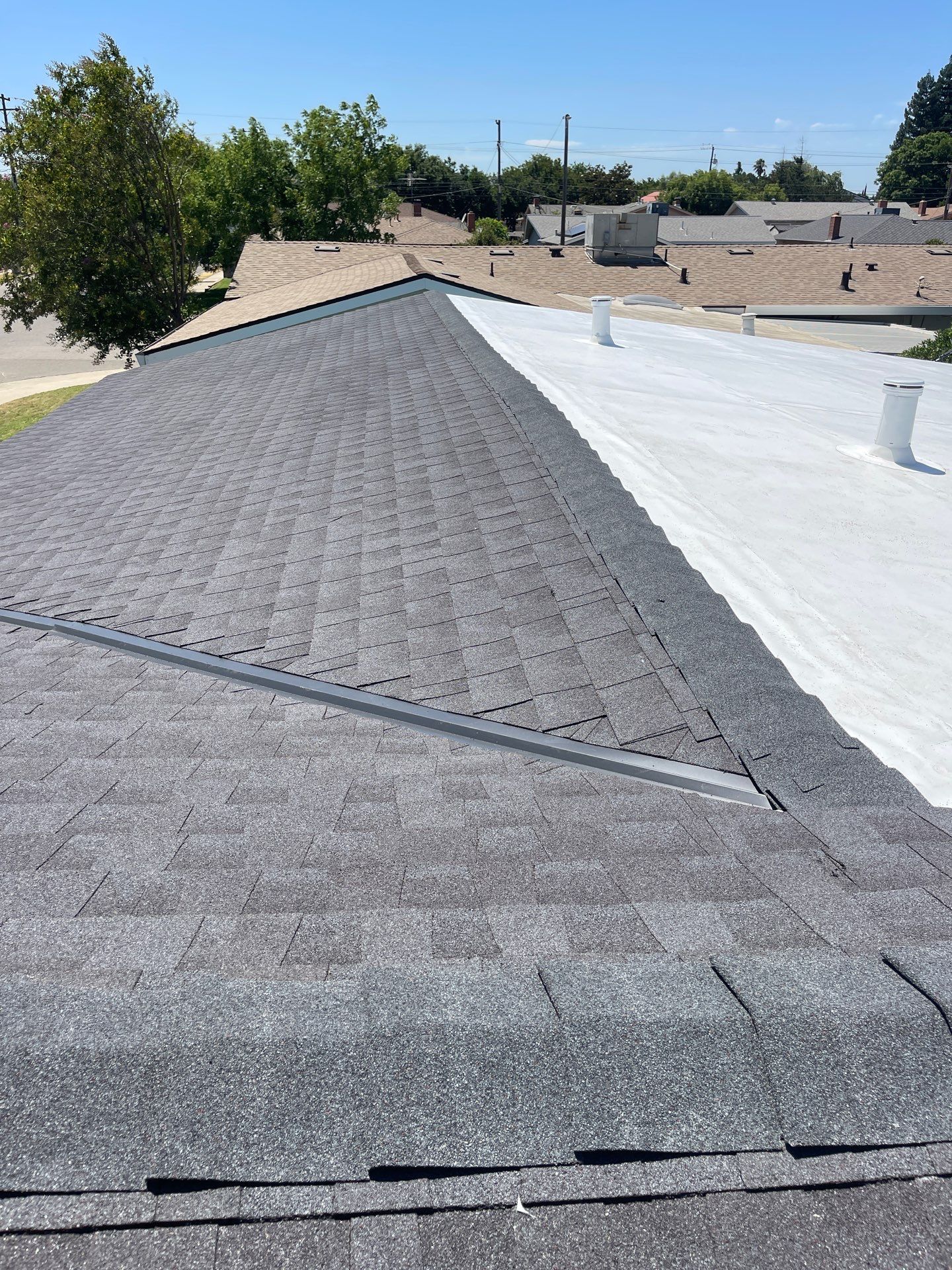 Osborn Terrace Atwater  by Econo Roofing
