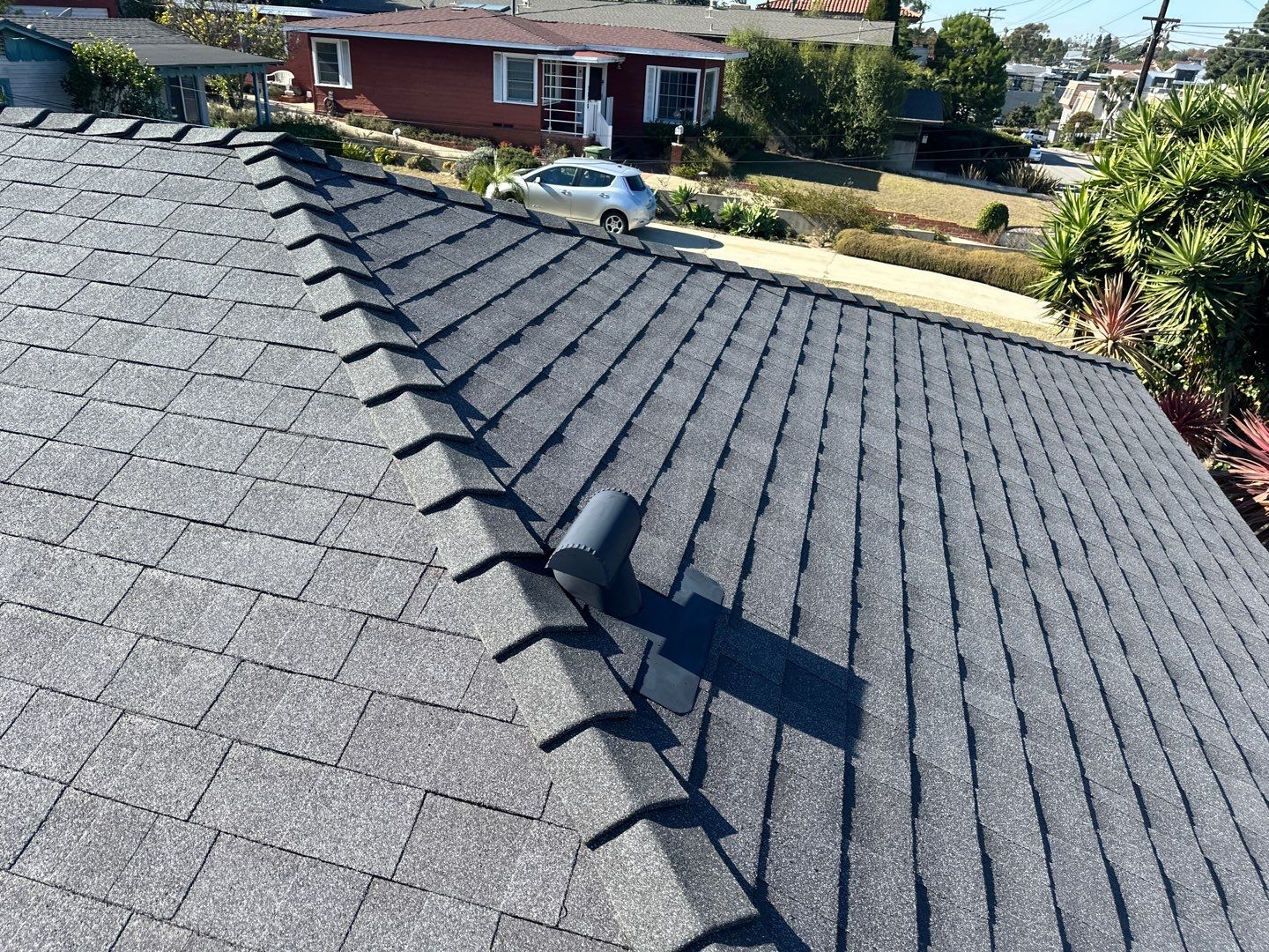 Estate Gray Shingles by Reimagine Roofing