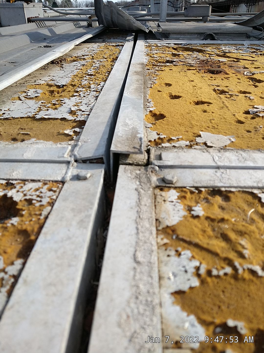 Commercial Roofing Installation using Aluminum Roofing panels by Hostetler Roofing