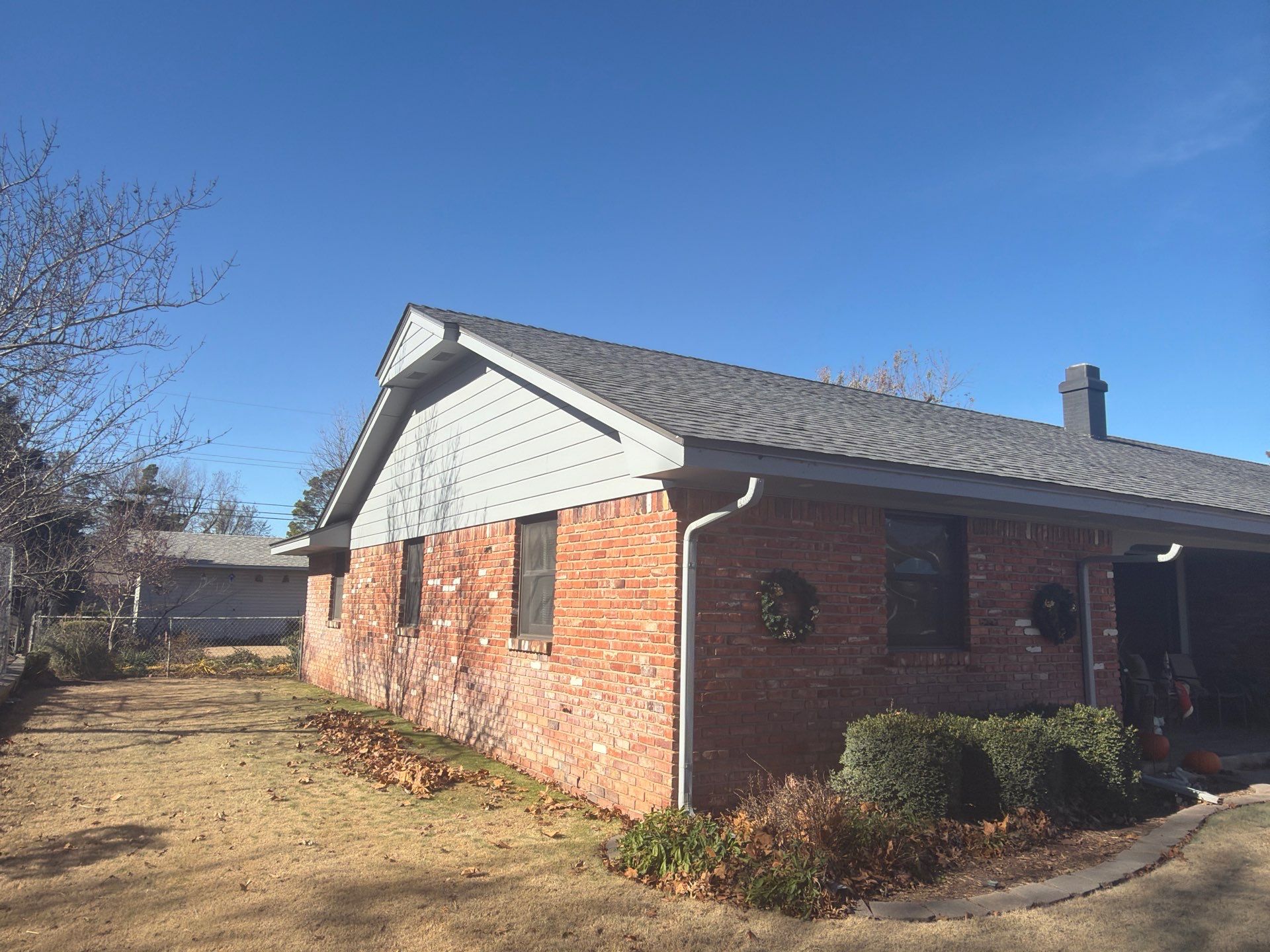 roof replacement in Norman by McCann's Roofing and Construction