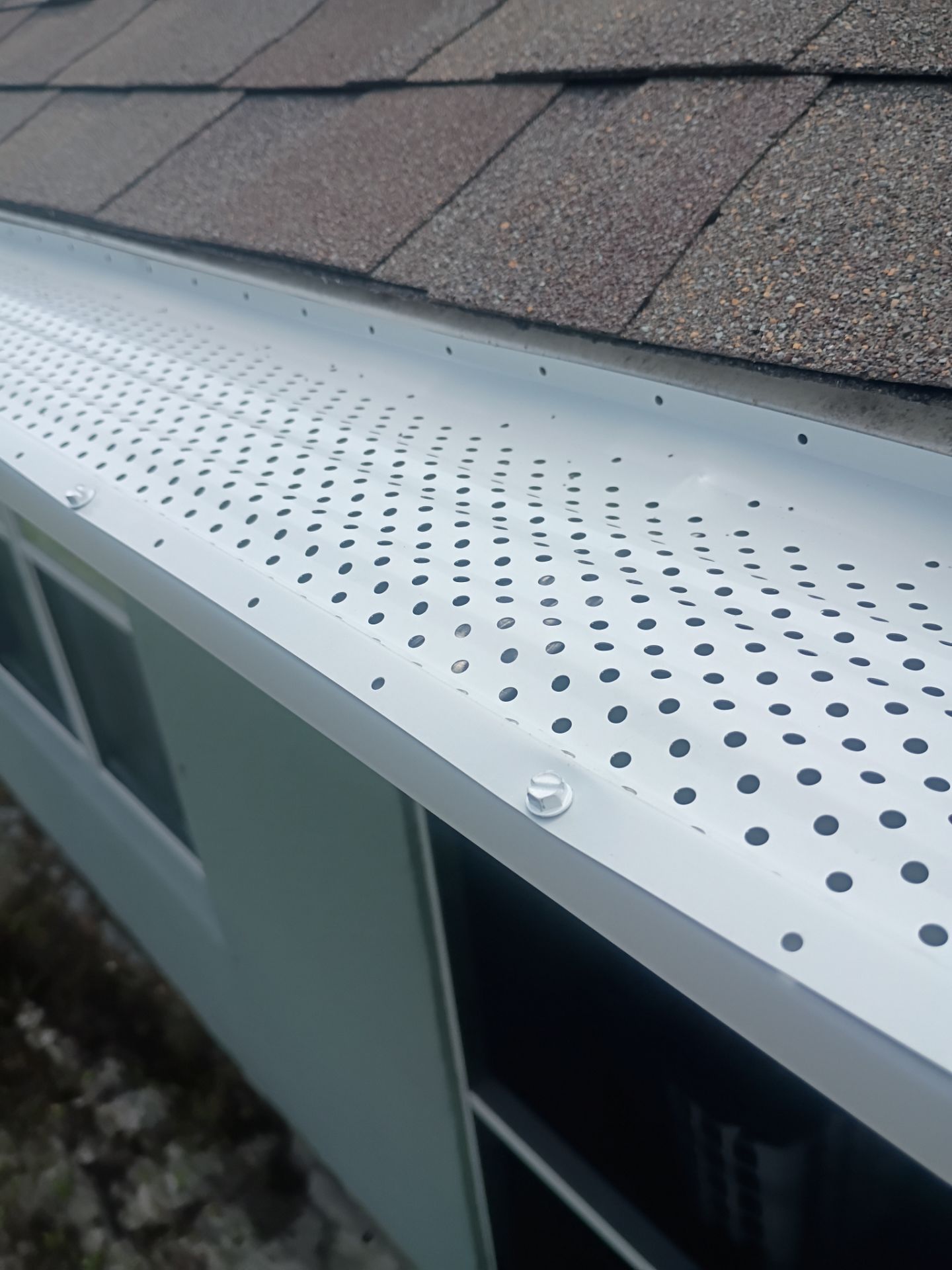 Gutter Guard and New Downspouts Installation in Punta Gorda FL by Gutter Professors