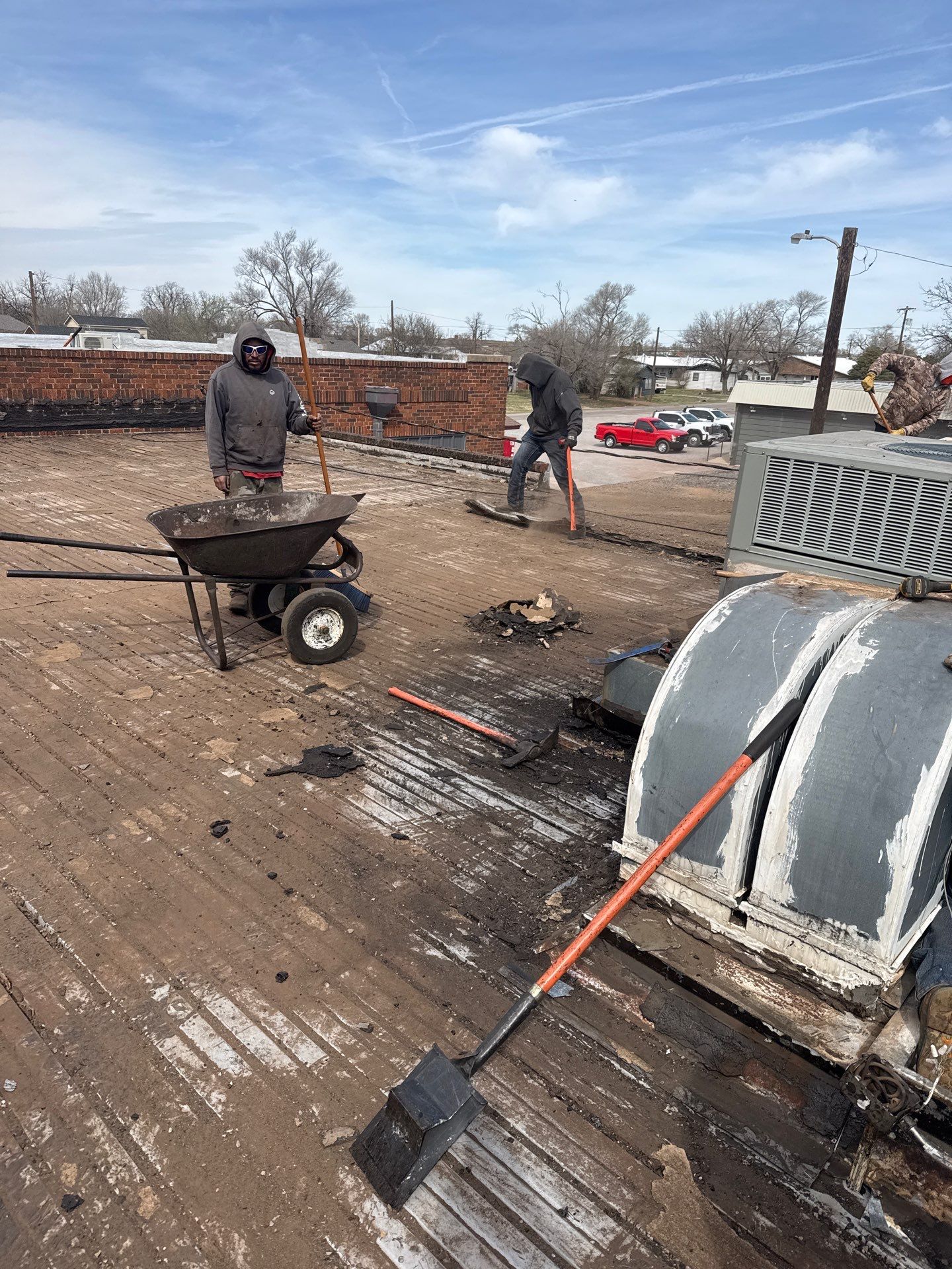 Hollis High School Comprehensive TPO Roof Replacement and Restoration by Secondary Rhodes