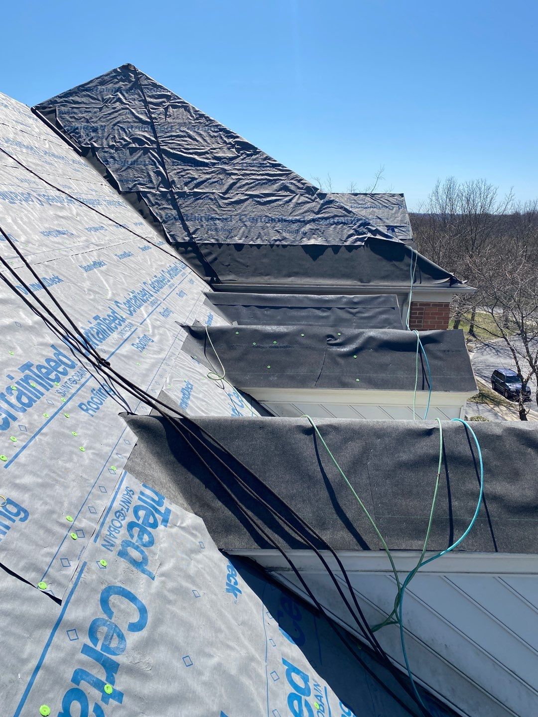 New Roof Installation & New Gutters and downspouts  by Alpha Design Services