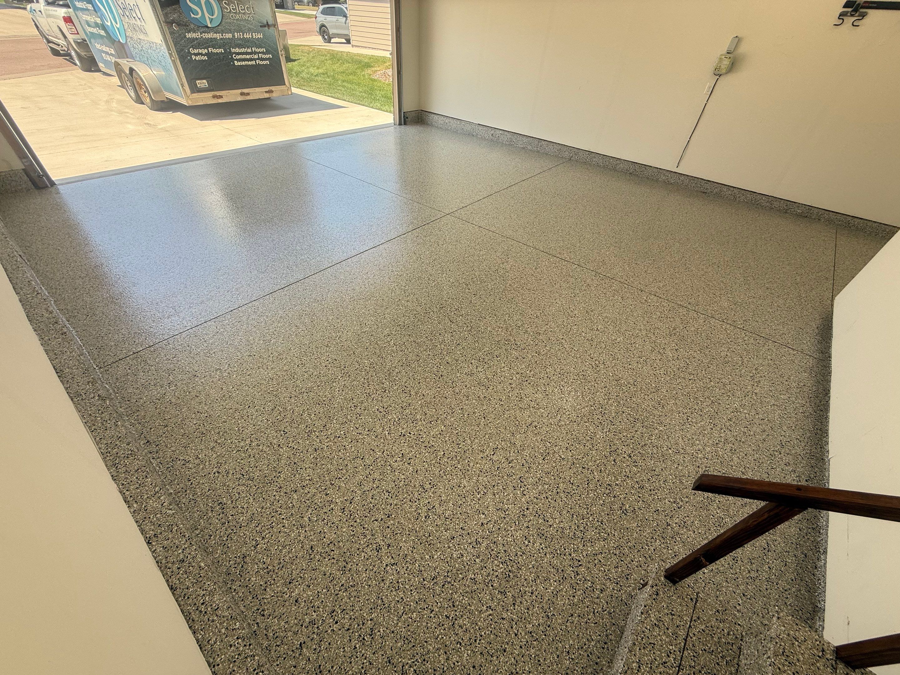 Cabin Fever Garage Floor Coating in Sioux Falls by Select Painting, Coatings & Garage Cabinets