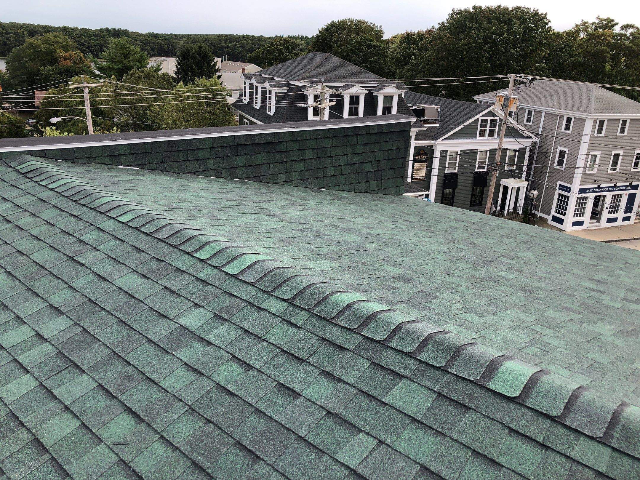 Hunter Green Roofs by Pinnacle Roofing & Skylights