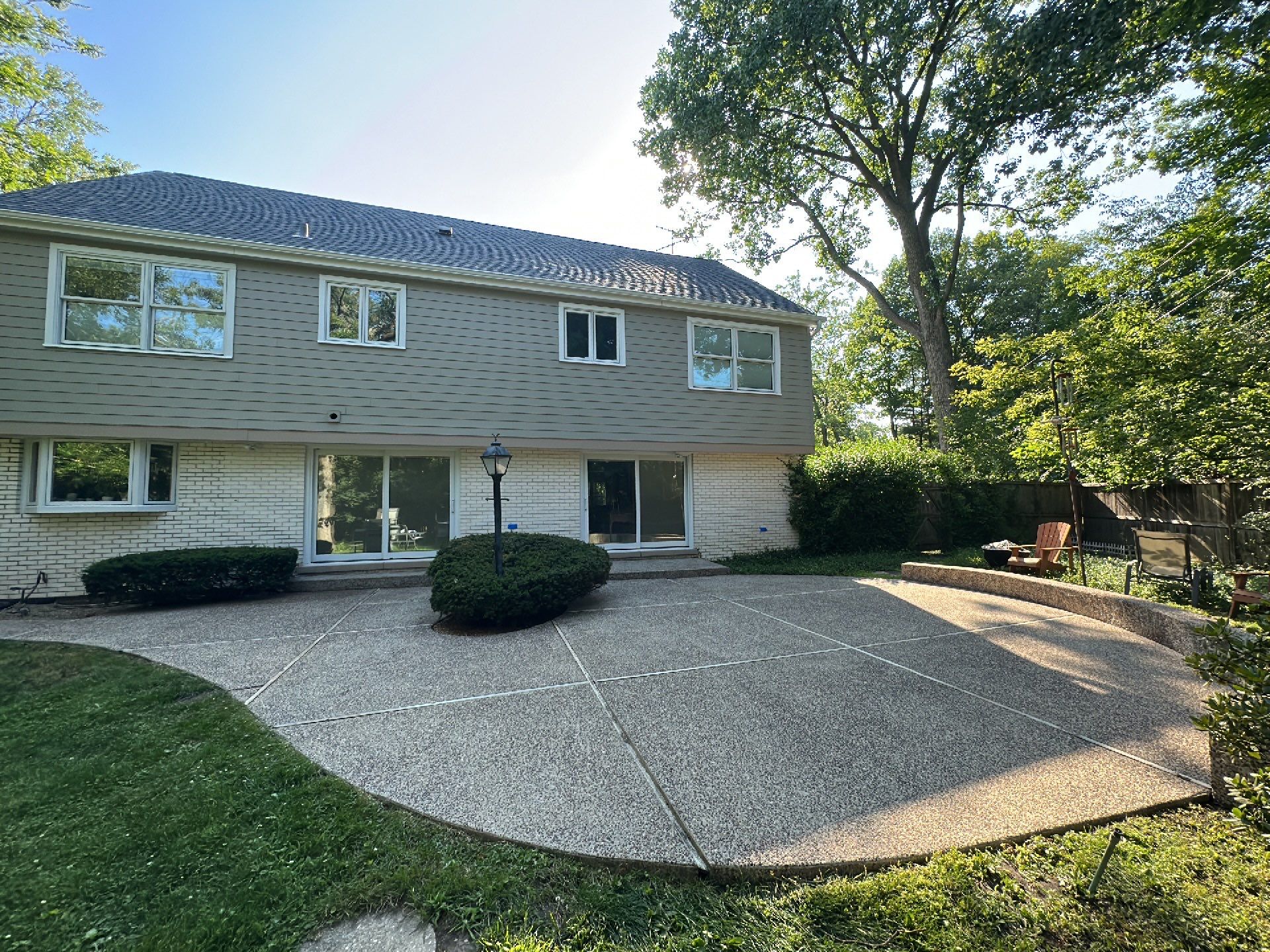 Aggregate concrete cleaning and sealing using Surebond SB-9000 by Northern Power Washing LLC.