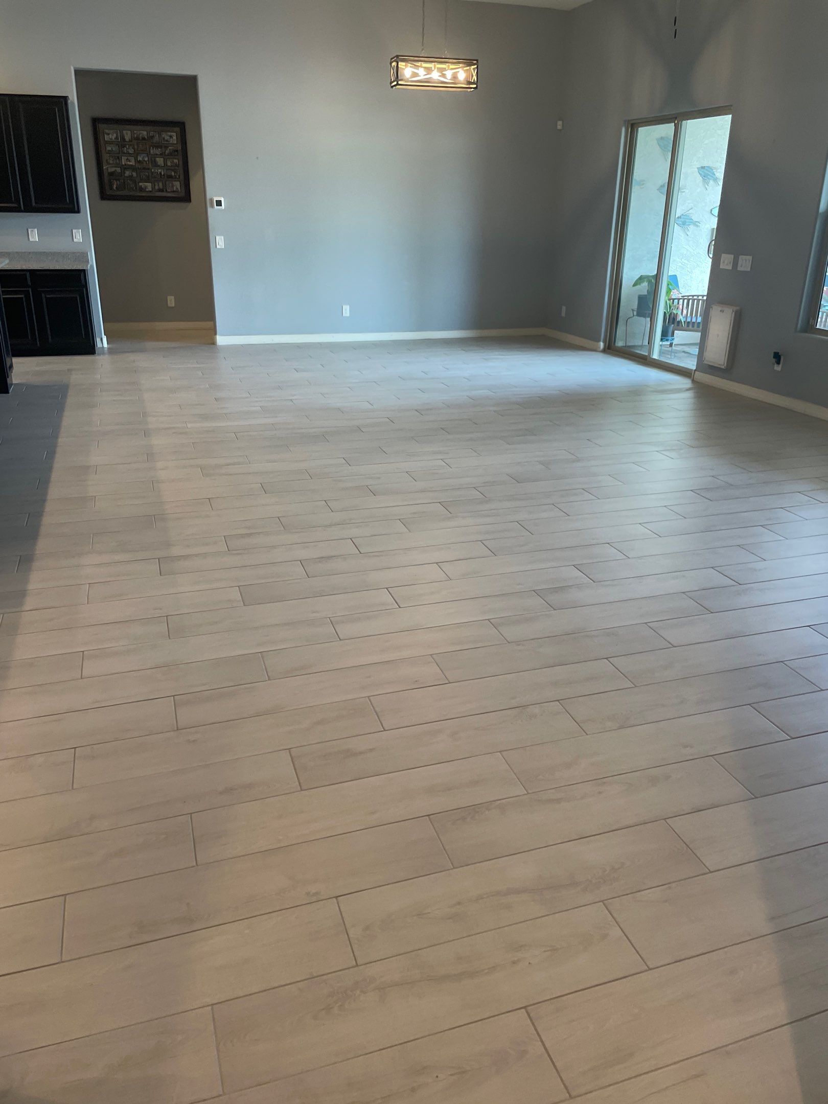 Wood Look Tile Floors and an Extra Large Shower  by Footprints Floors of Chandler 