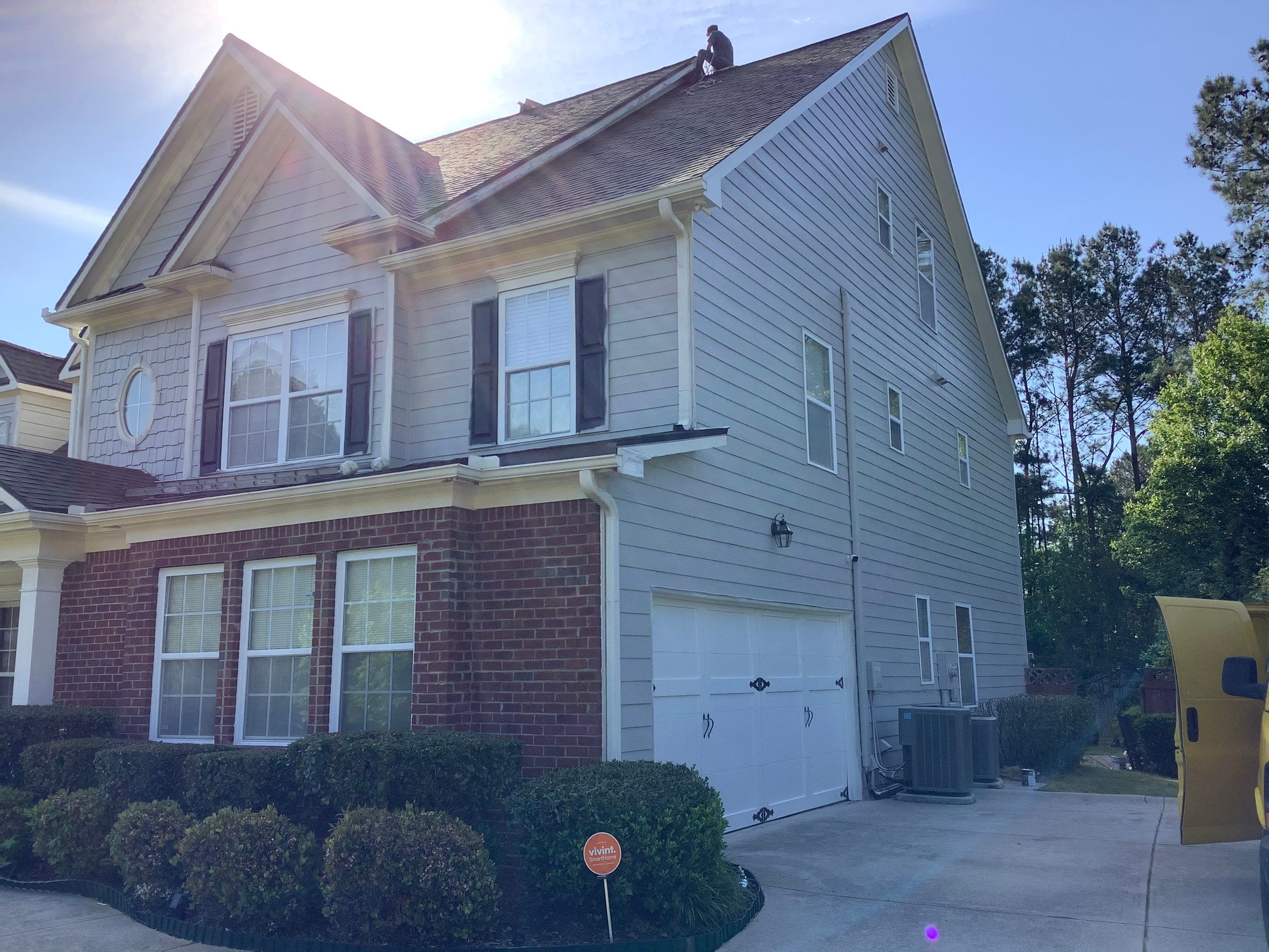 Exterior Home Refresh in Powder Springs with Gray Siding and White Trim by Swift Home Renovations