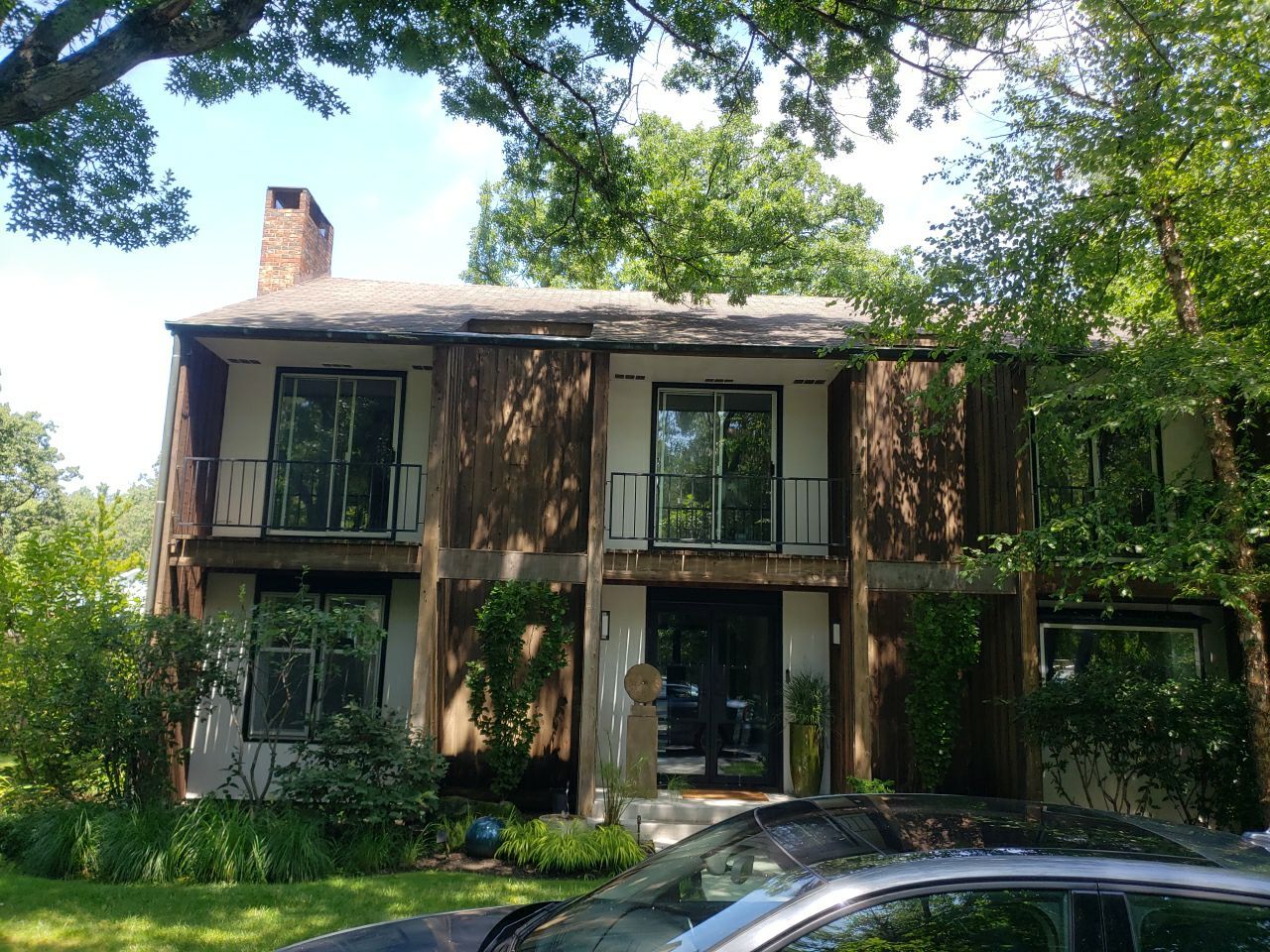 Asphalt Roof Replacement with Half Round Copper Gutter Installment  by Custom Installations