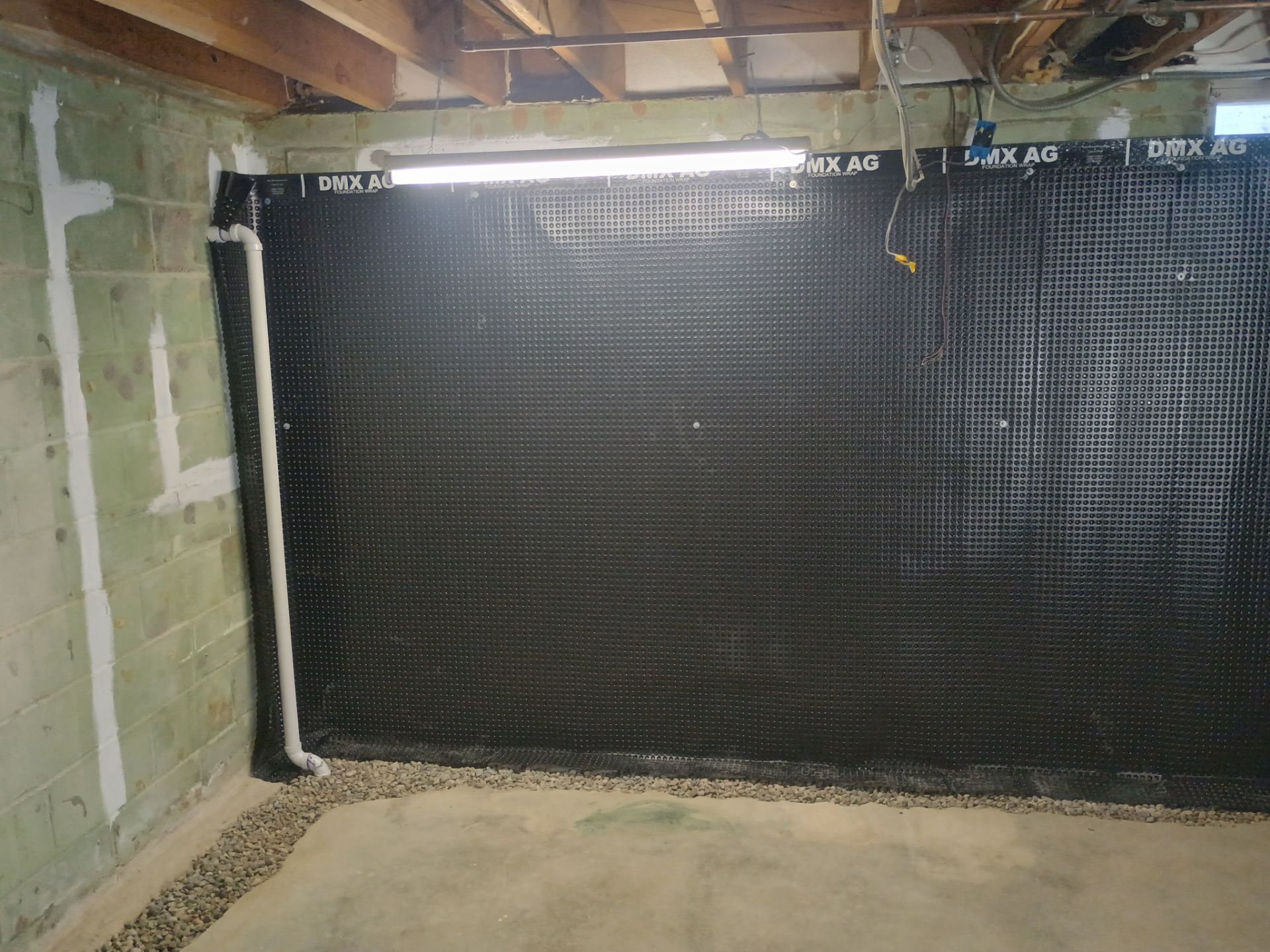 Interior Drain Tile & Wall Drainage in Southwest Minneapolis by Waterproofing Northeast